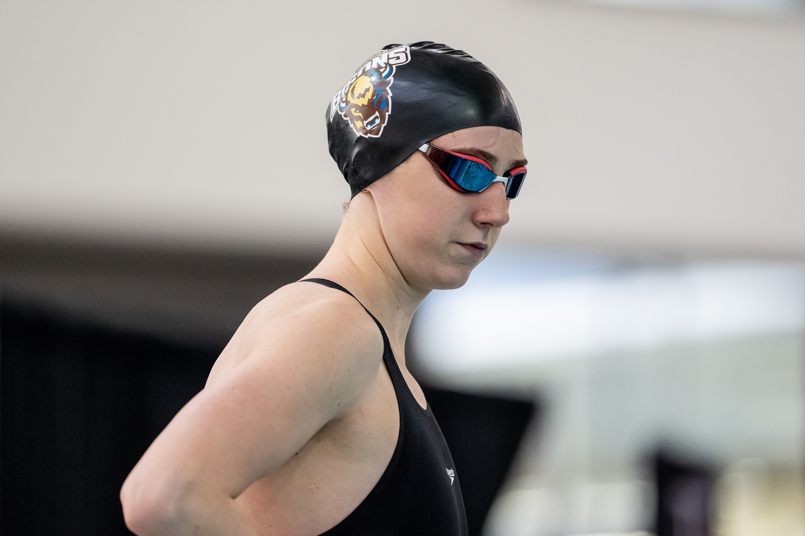 Bisons swimmer Ella Howe in her cap and goggle before a race