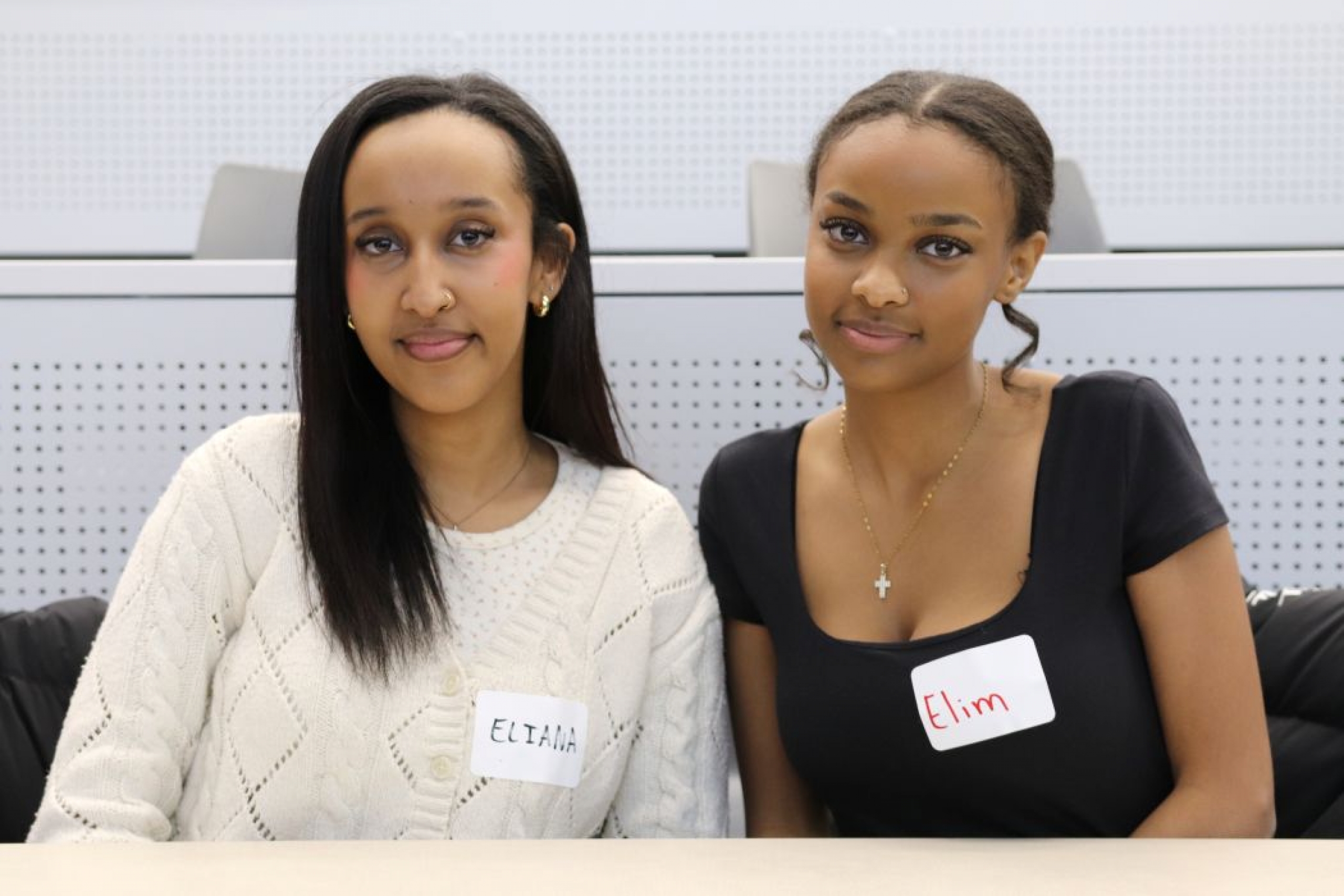 Two people pose for a photo. 