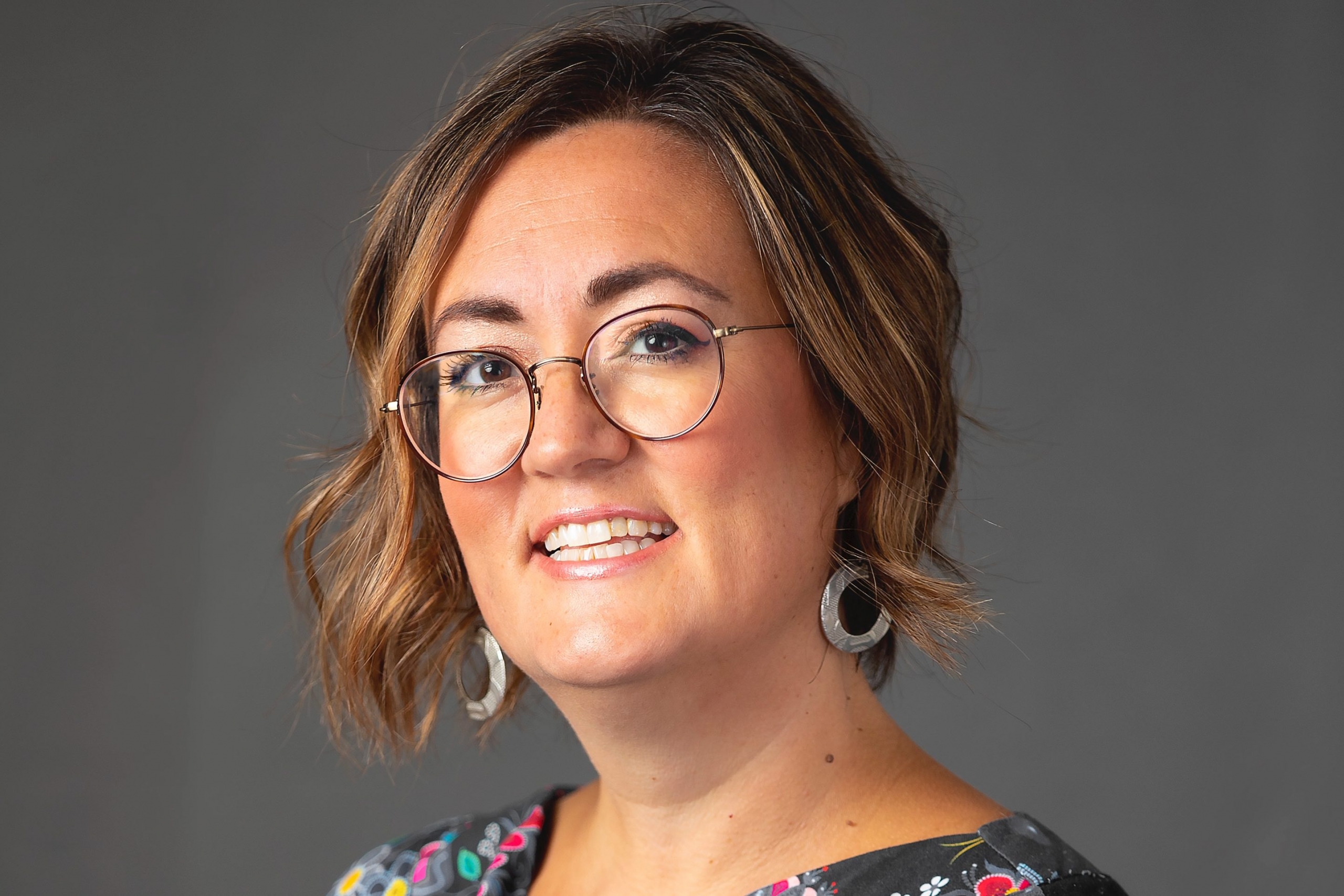 Headshot of Professor Brenda Gunn smiling at the camera