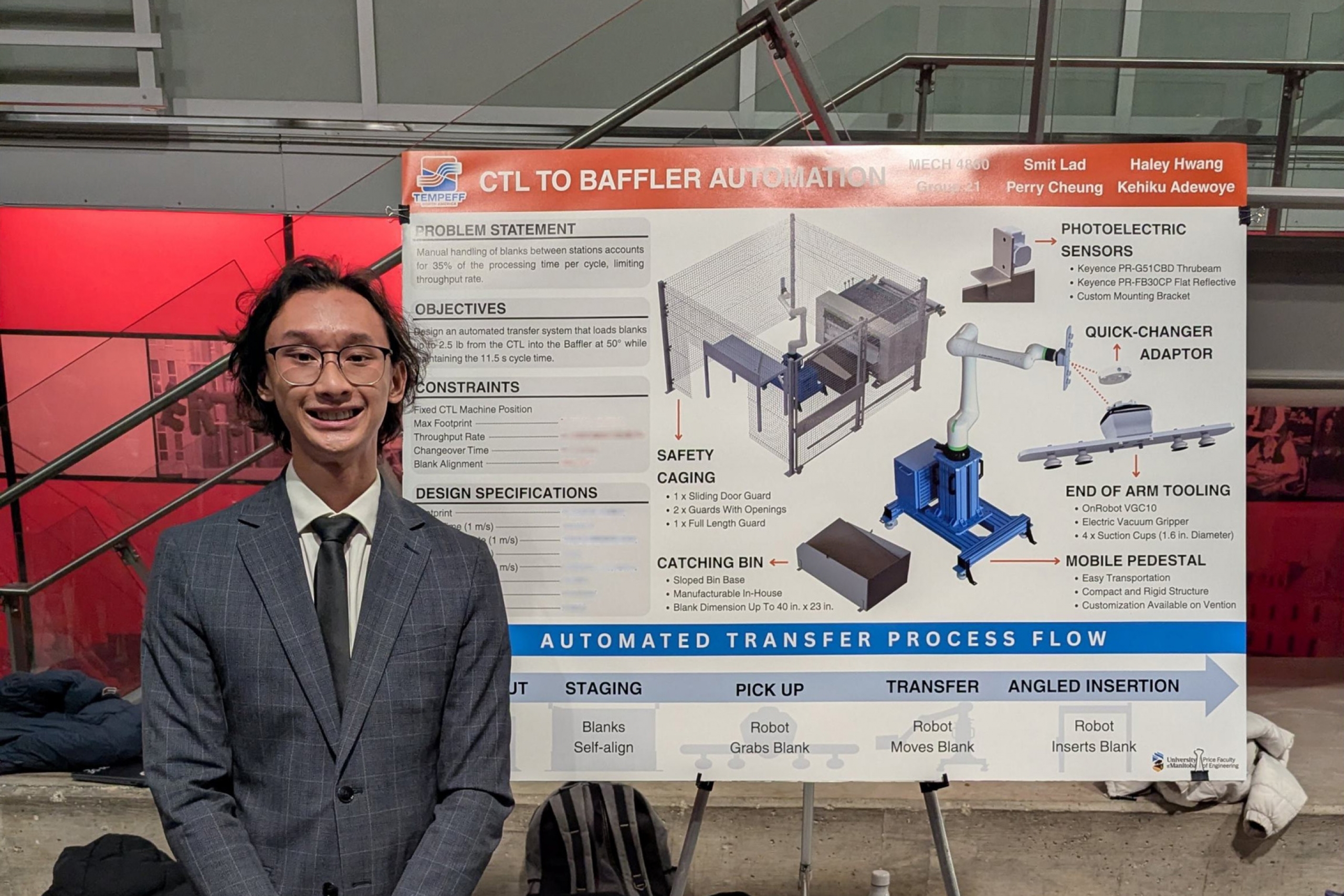 Perry Cheung in the engineering atrium standing next to a poster board title CTL to Baffler Automation
