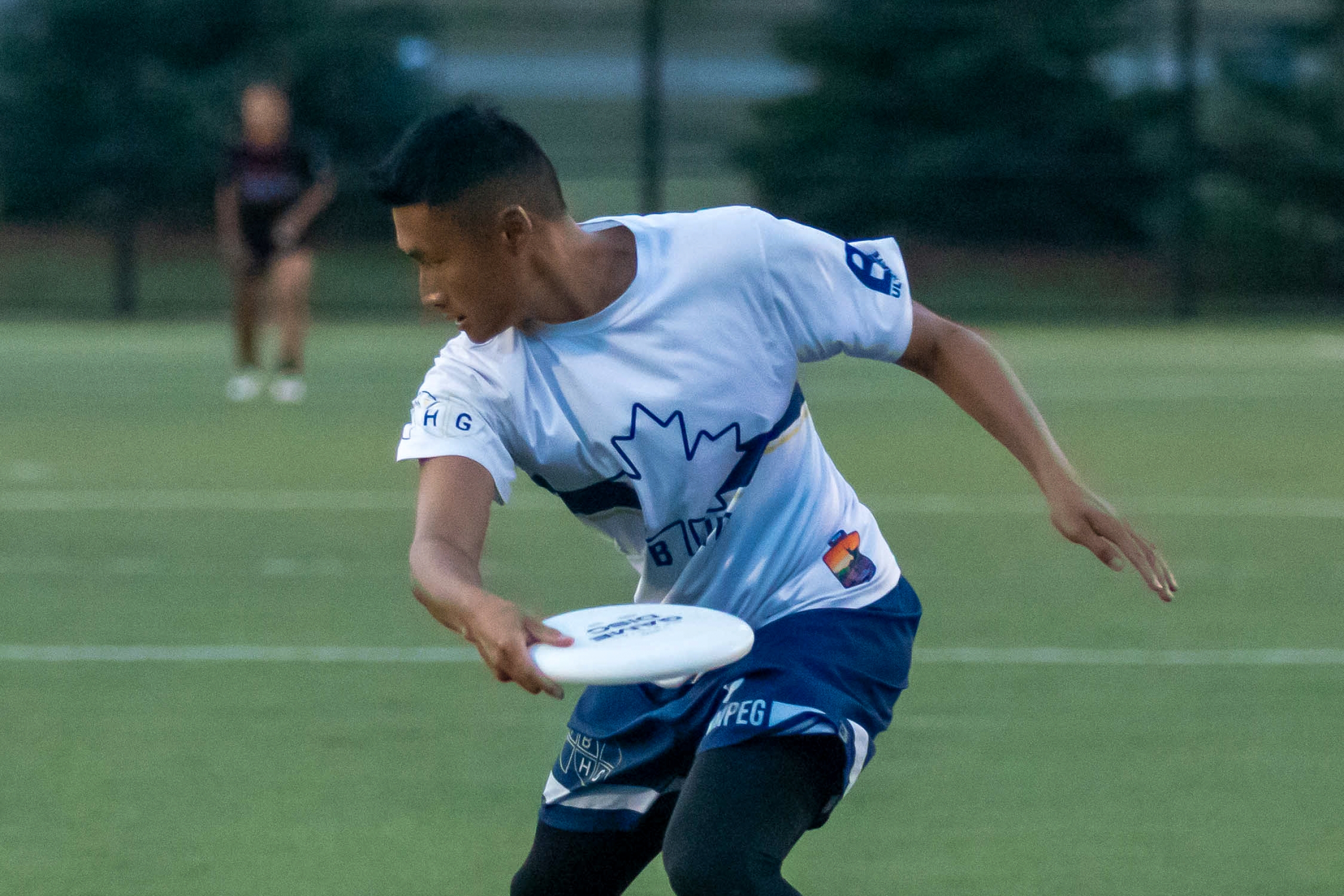 Elliot Wong playing ultimate Frisbee