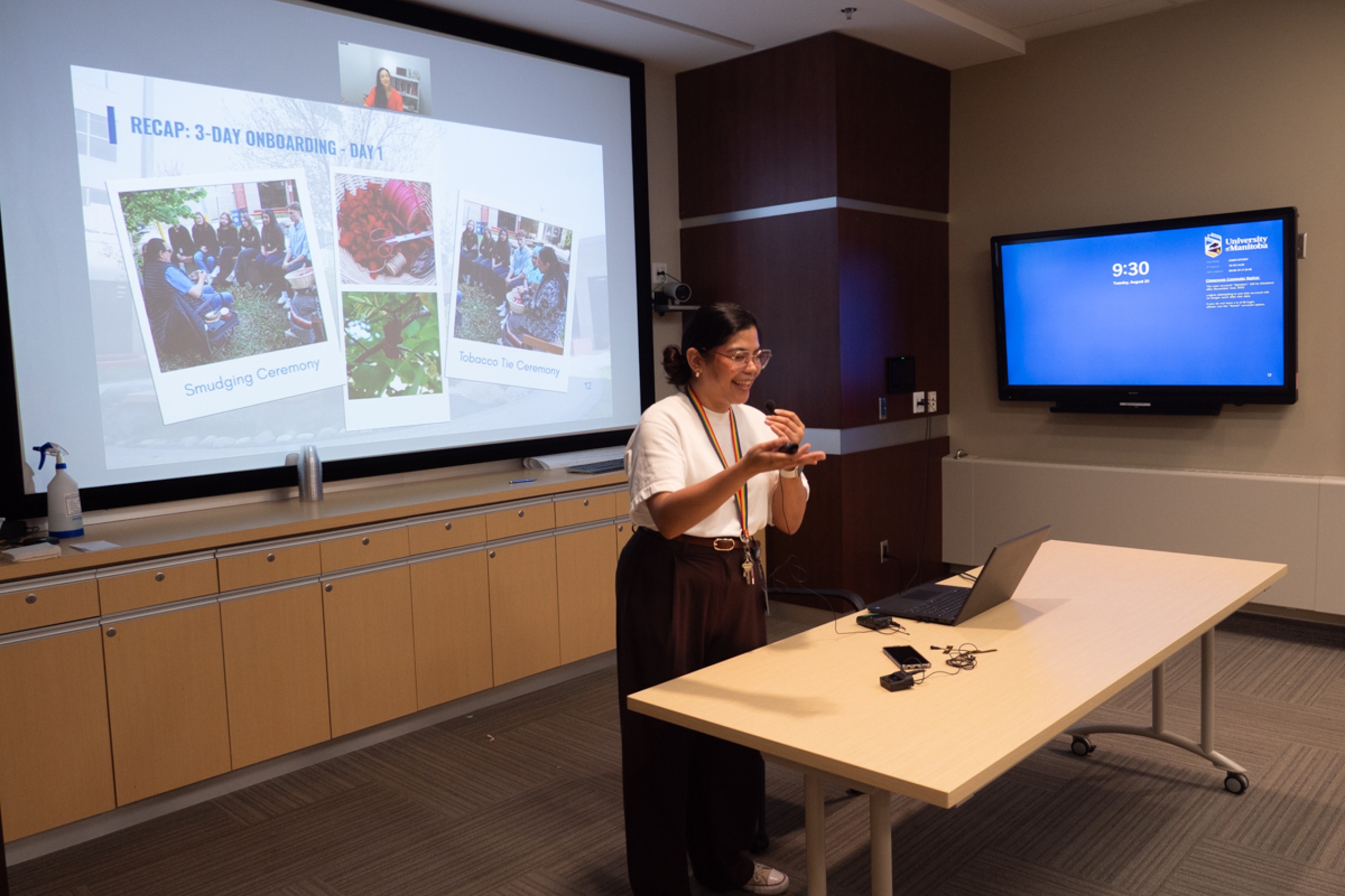 A person presenting in a boardroom.