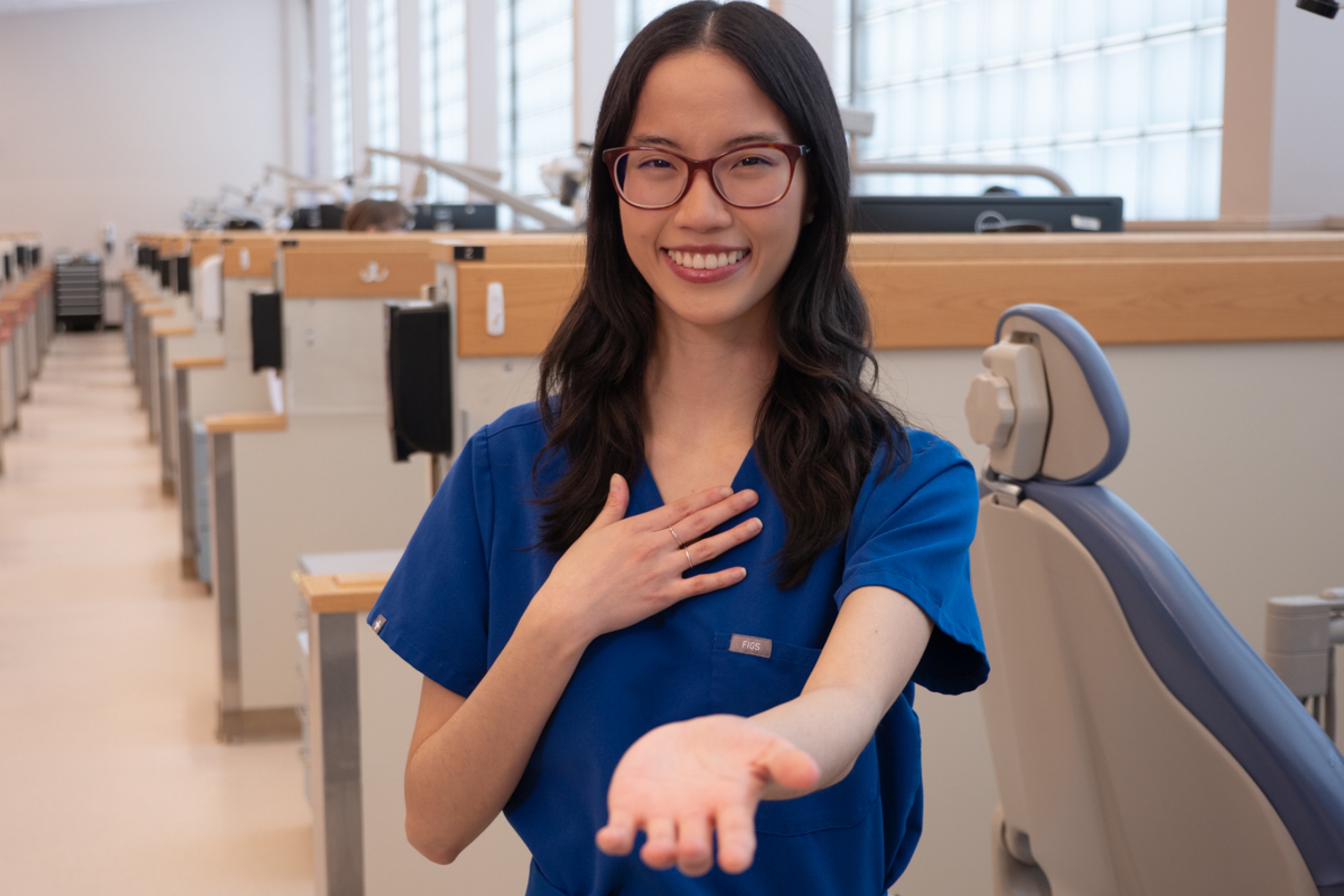 Sophie Chen strikes the Give to Gain pose.