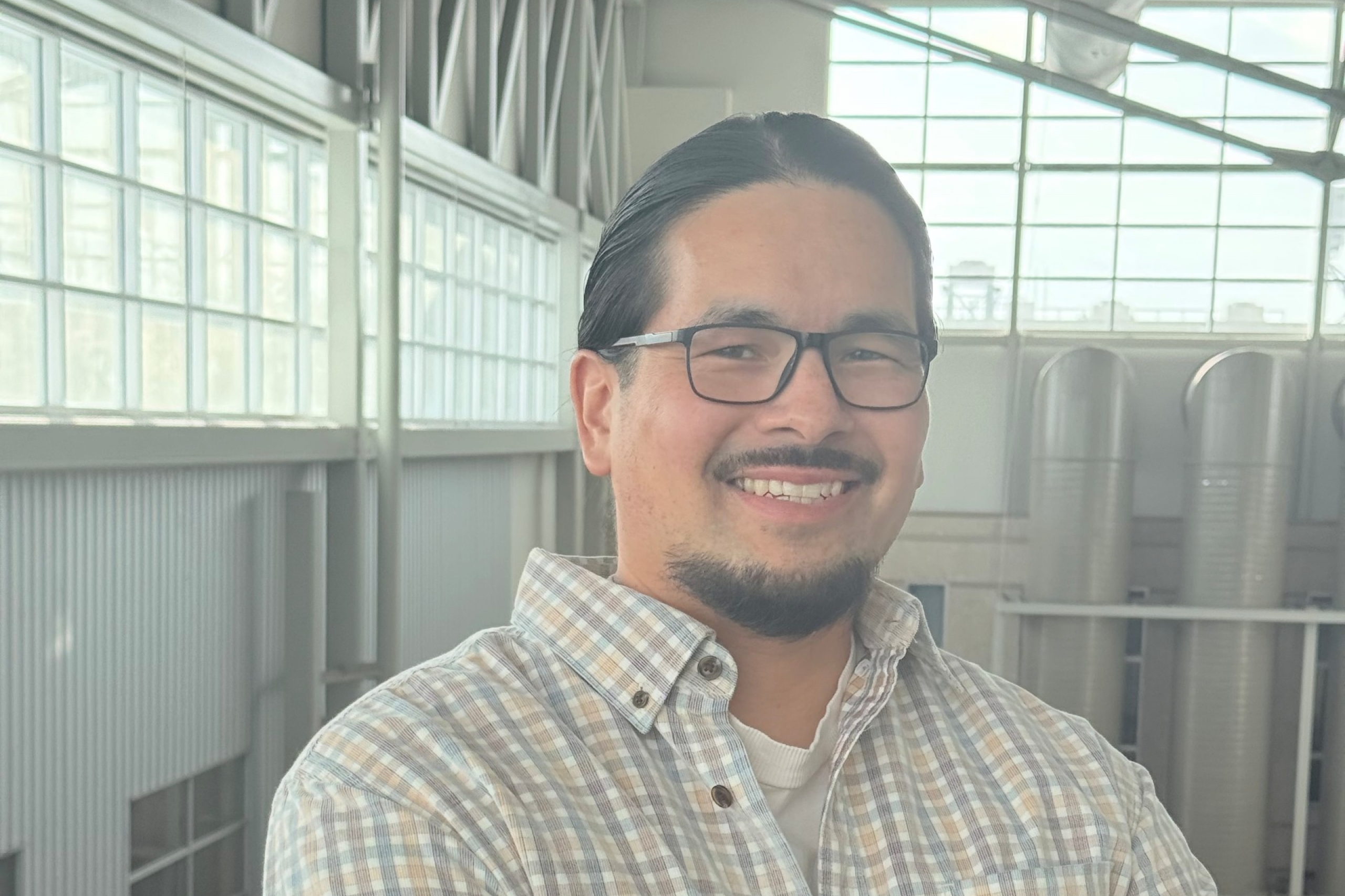 A person posing inside