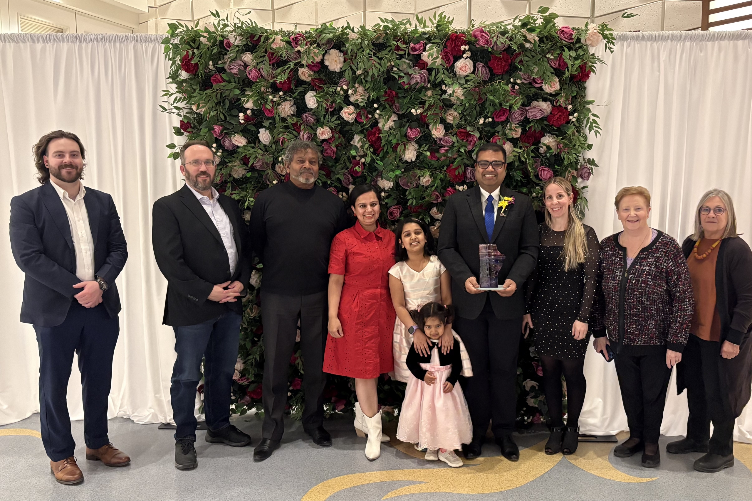 Dr. Nitash Sanghai with community and family members