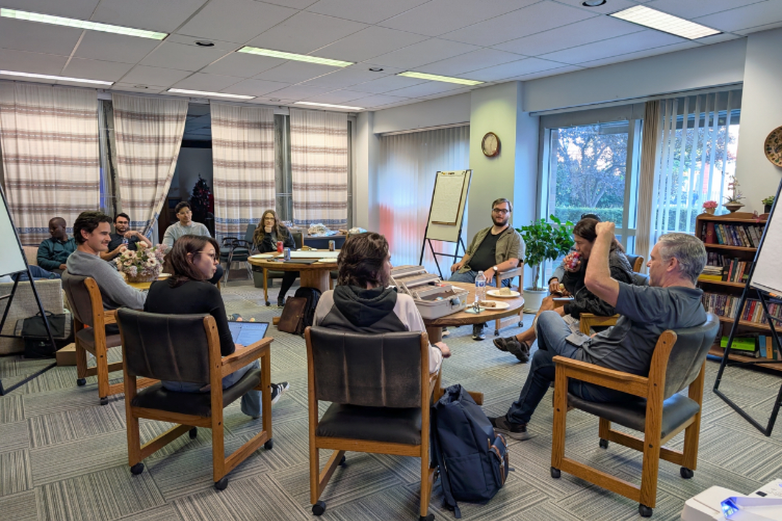 team connect 5 sits in a boardroom