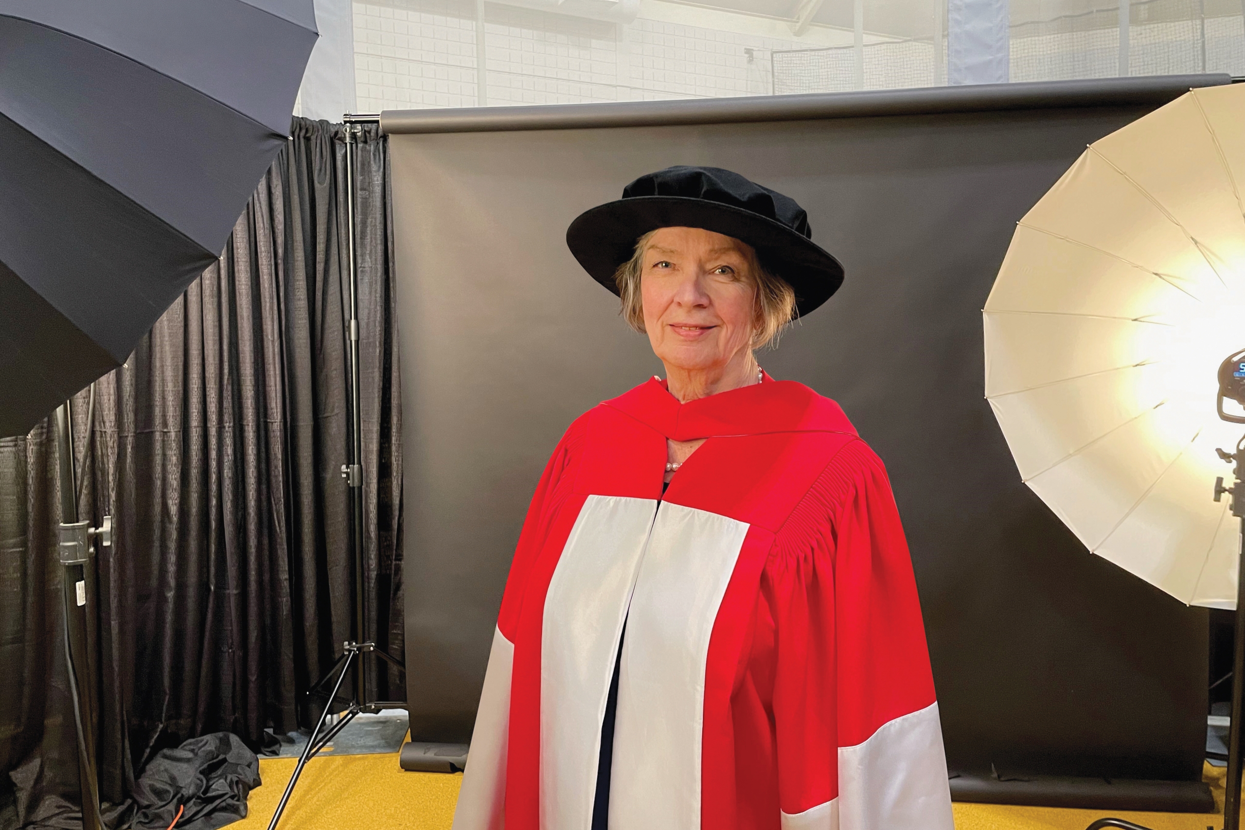 Jan Currie poses backstage before receiving her honorary degree.