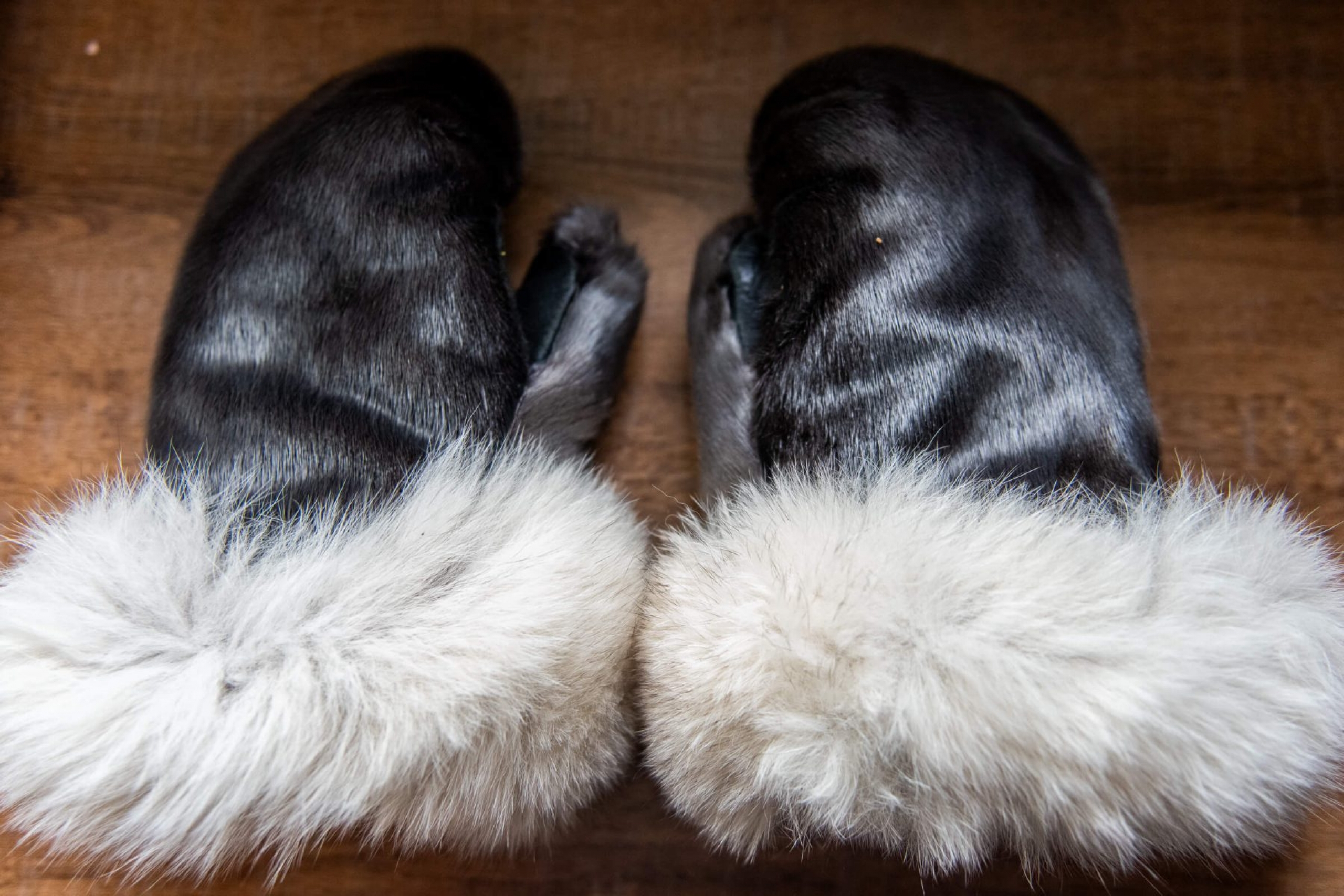 A pair of fur mitts