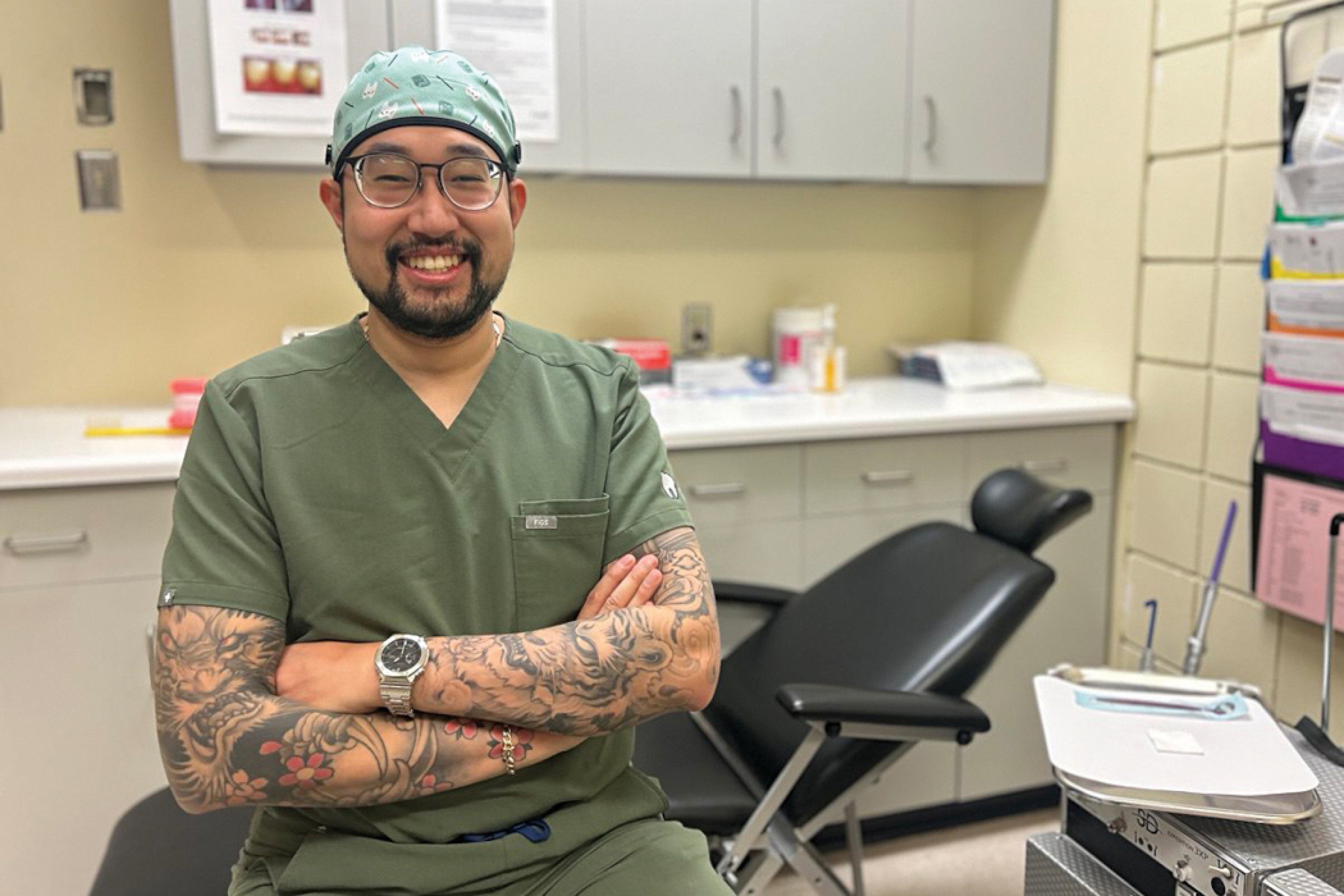 David Van poses for a photo in a clinical setting. 