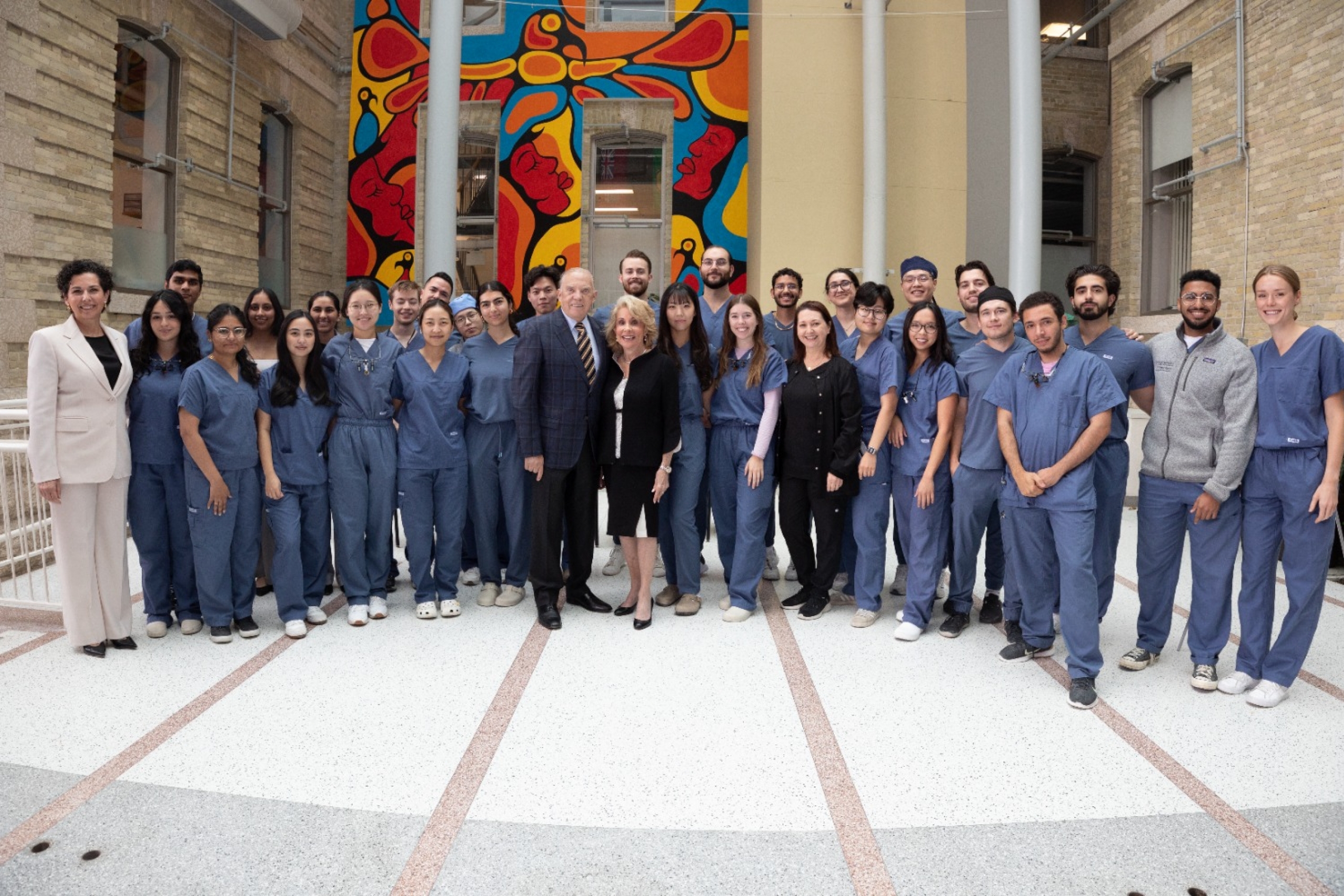 Dr. Gerry and Reesa Niznick with dental students