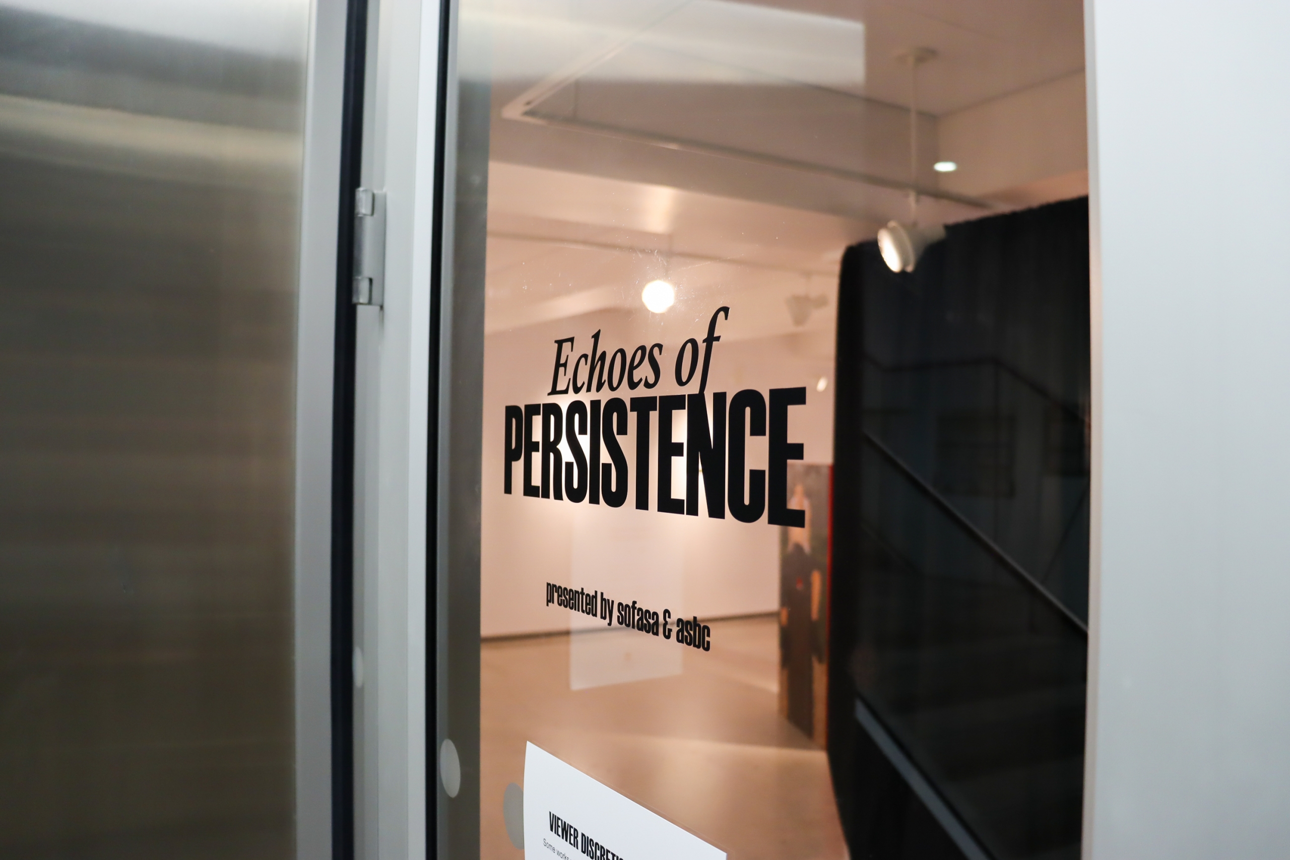 Entrance view of the Echoes of Persistence exhibition at the Student Gallery.