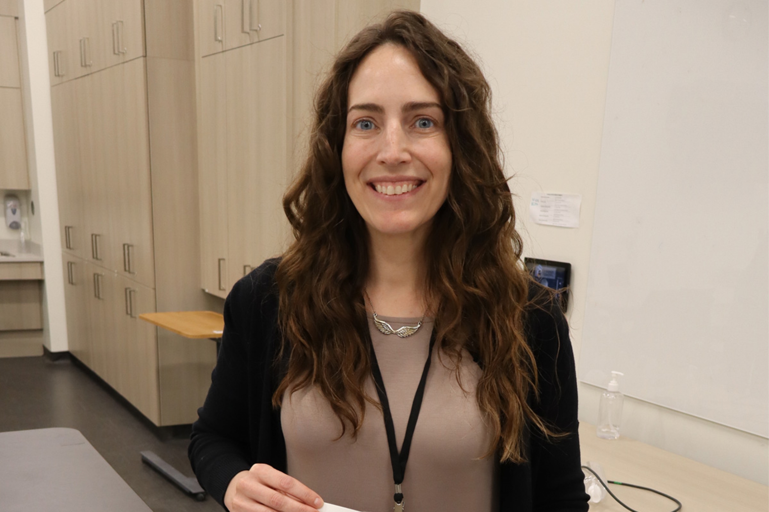 Erin Schellenberg poses after winning an award.
