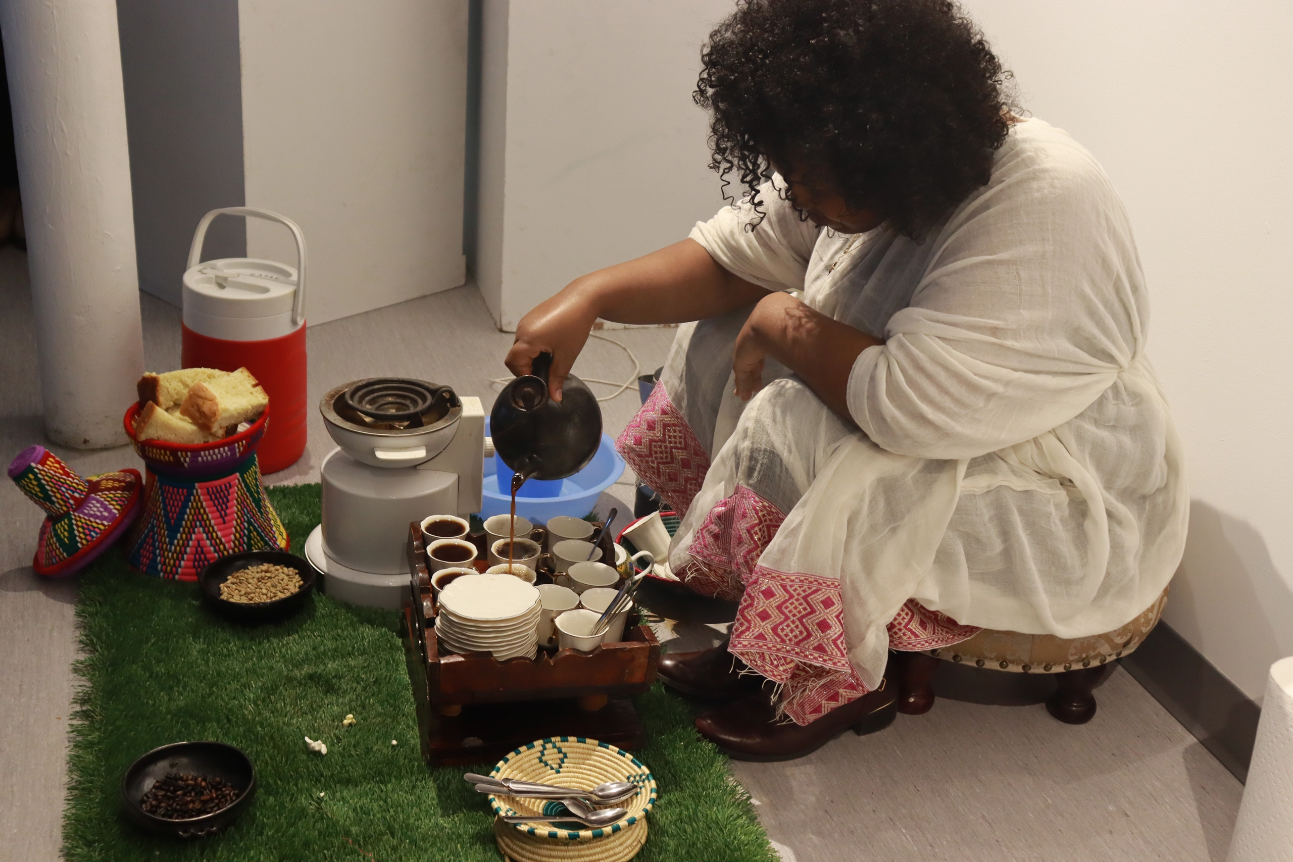 Coffee being brewed and served at the Ethiopian Clay Kaarig gathering