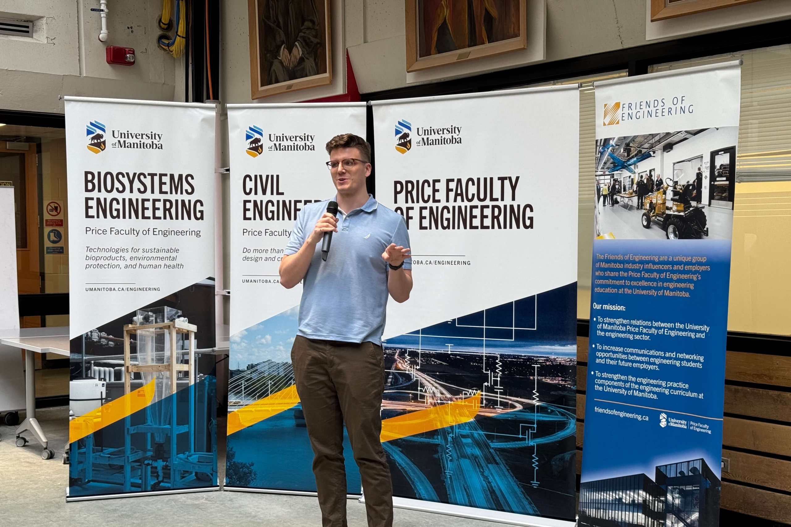 A person speaking on a microphone