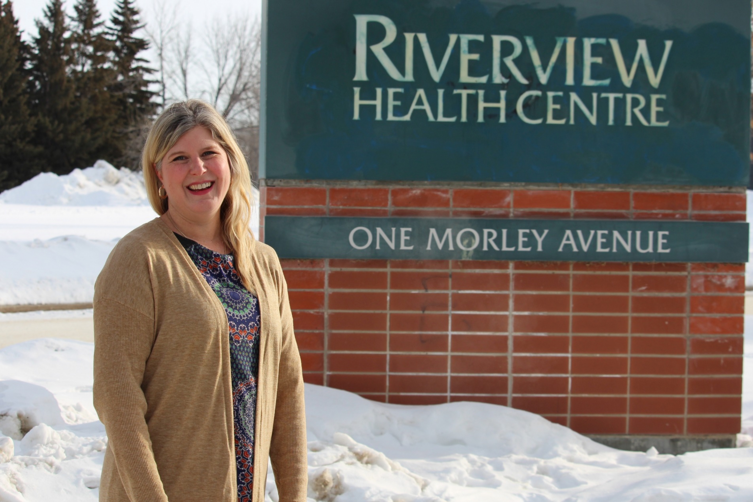 Genevieve Thompson standing outside Riverview Health Centre.