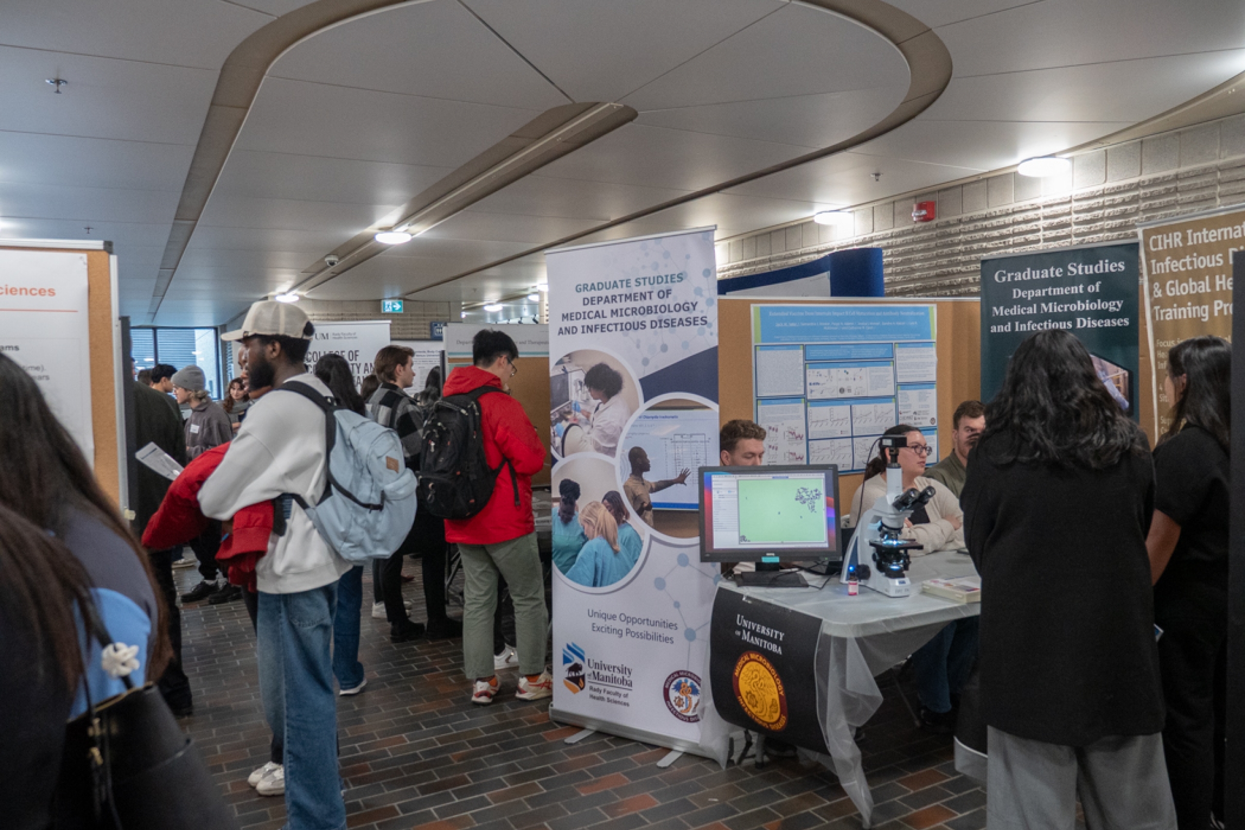 Students visit different booths.