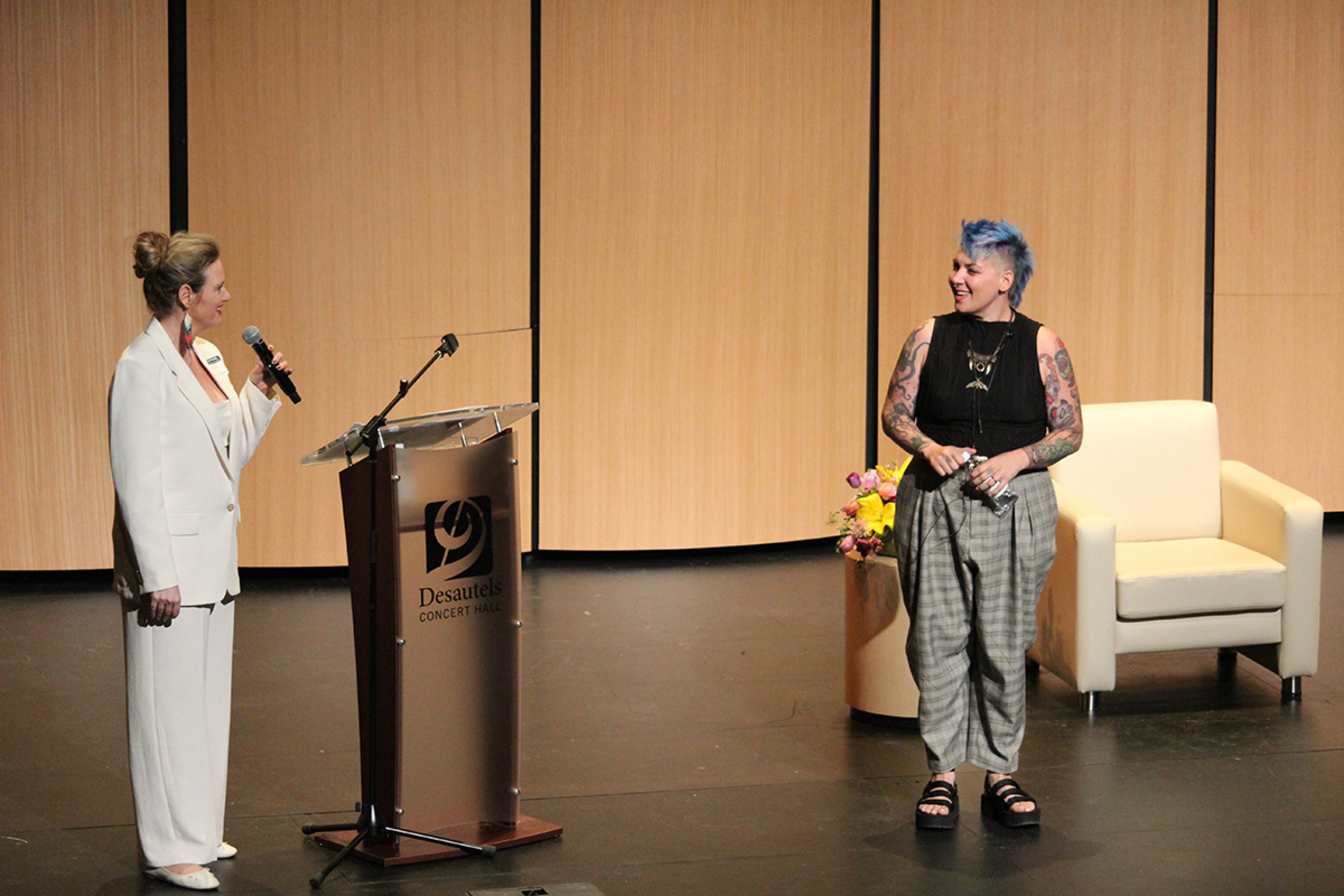 Marnie Kramer and Athena Sherman onstage at the Helen Glass Research Symposium.