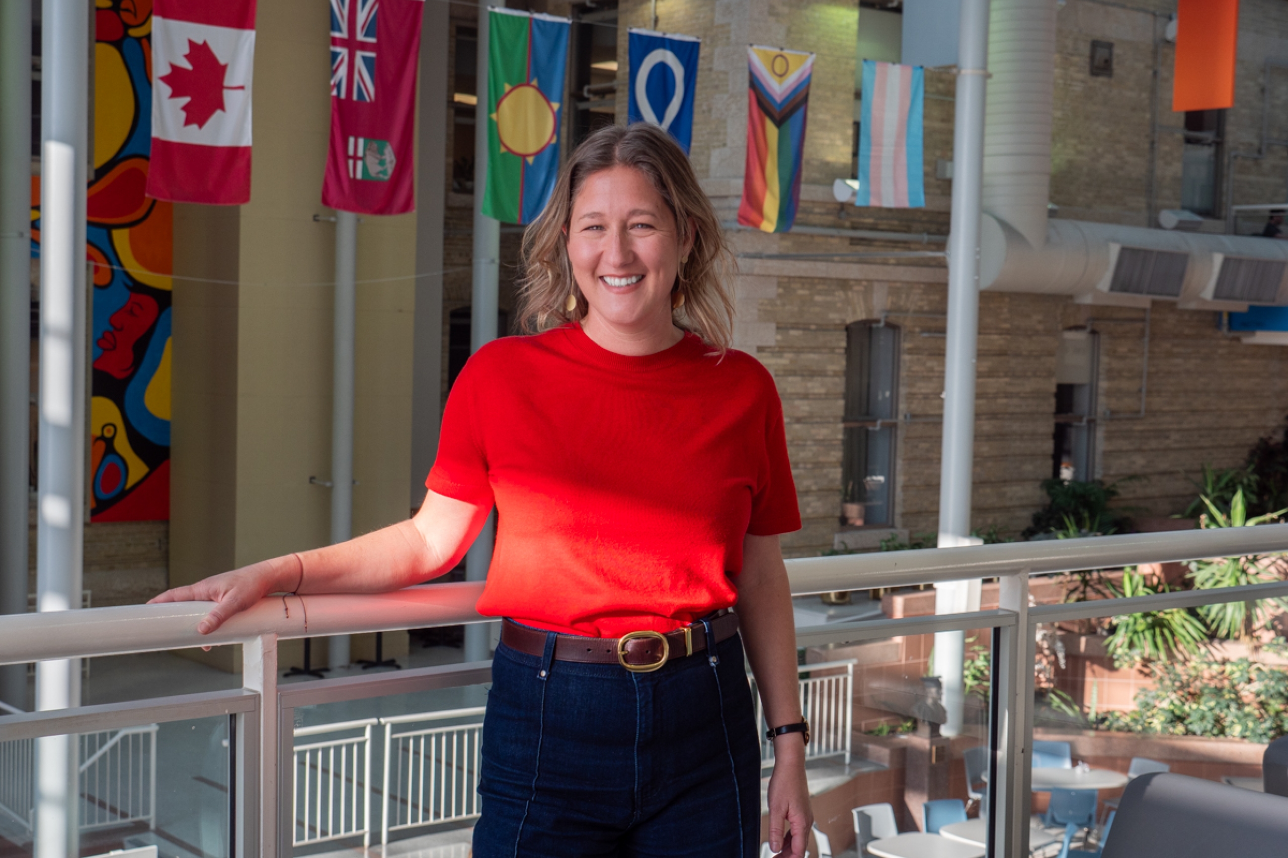 Nicole Herpai poses and smiles for the camera.