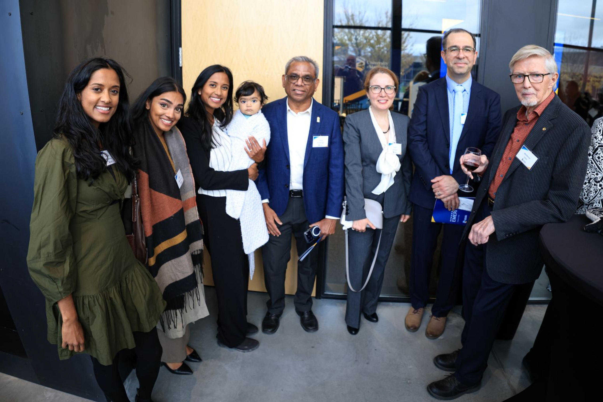 Udaya Deepa Annakkage (emeriti honouree) surrounded by a group of family and friends