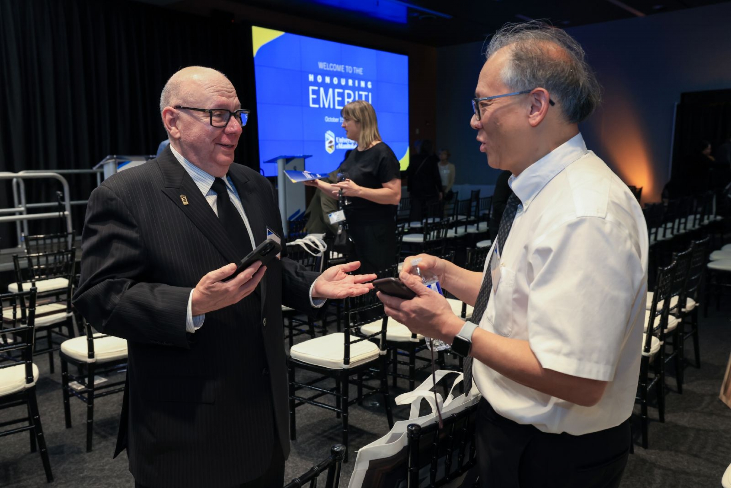 Darren Gillis talks with a colleague