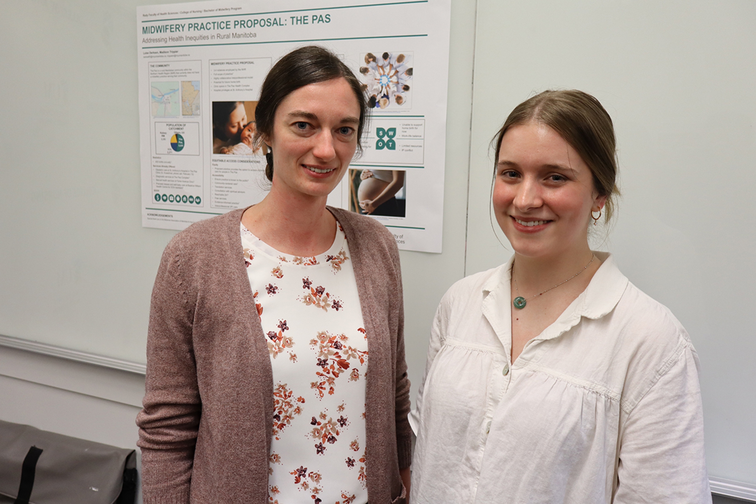 Luise Derksen and Madison Trippier in front of their poster.