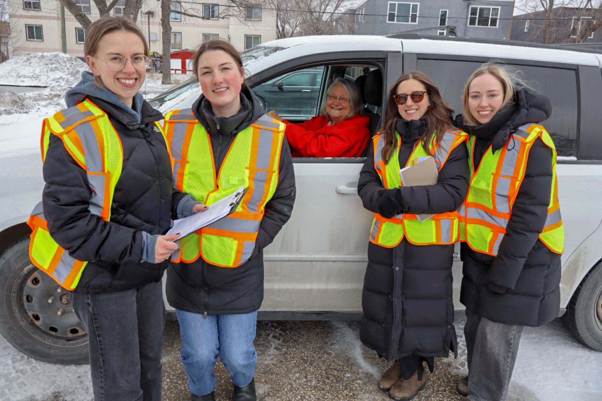 A group of occupational therapy students pose with a driver who received a DafFit assessment.