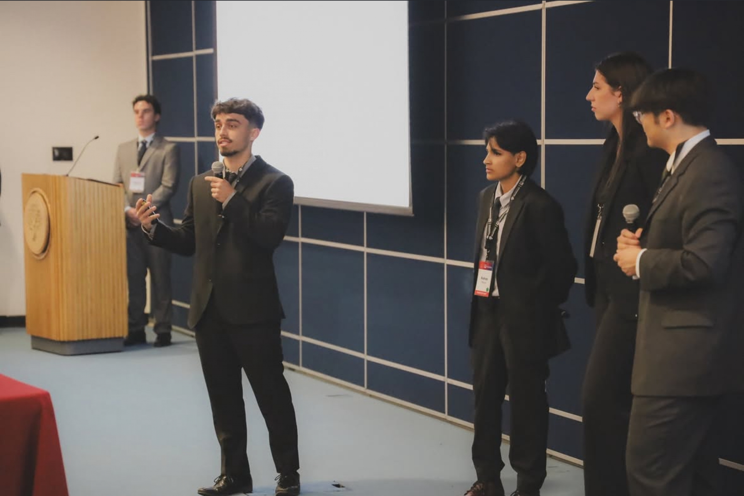 Daniel speaks at a case competition