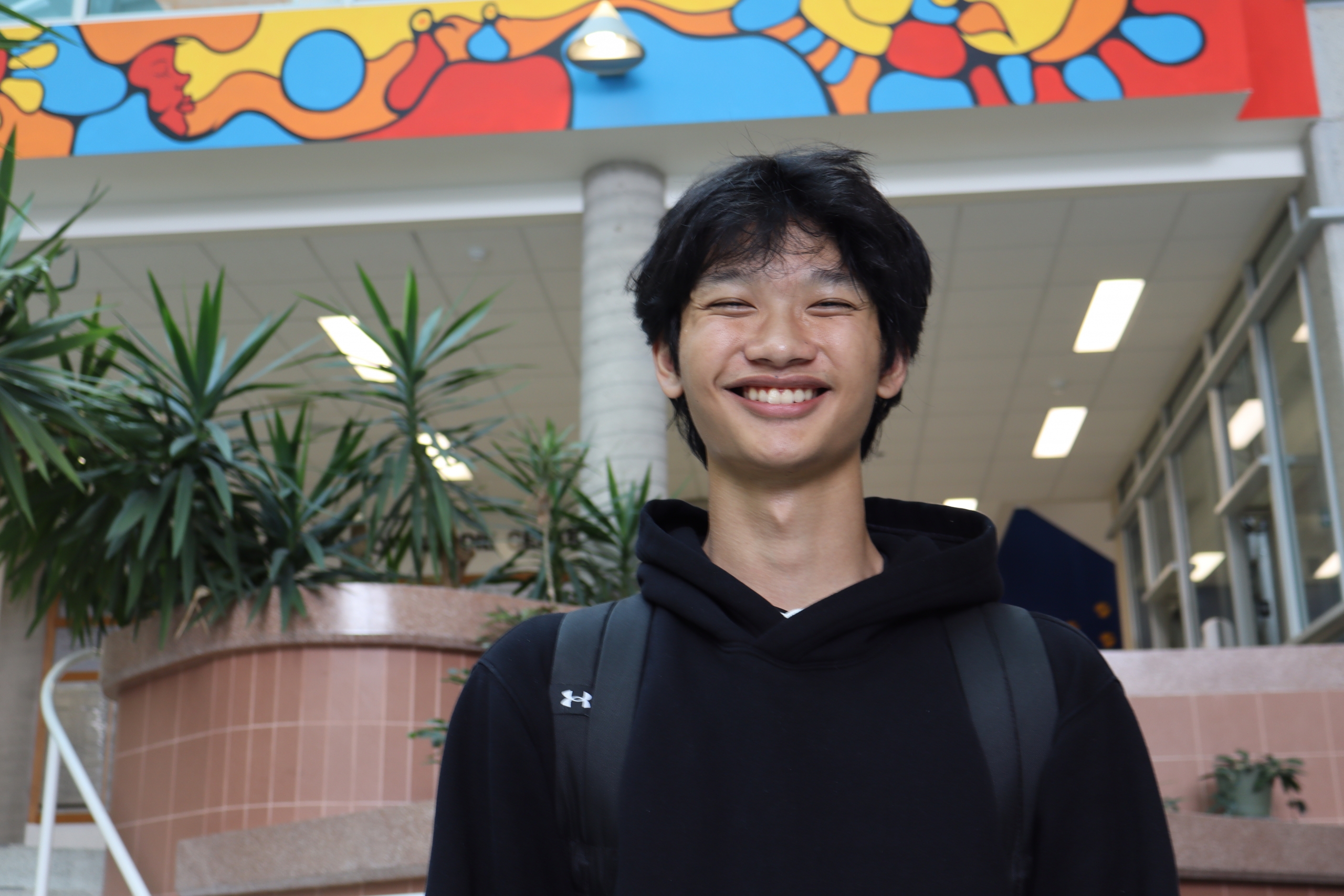 Mikhel Garcia in the Brodie atrium at Bannatyne campus.