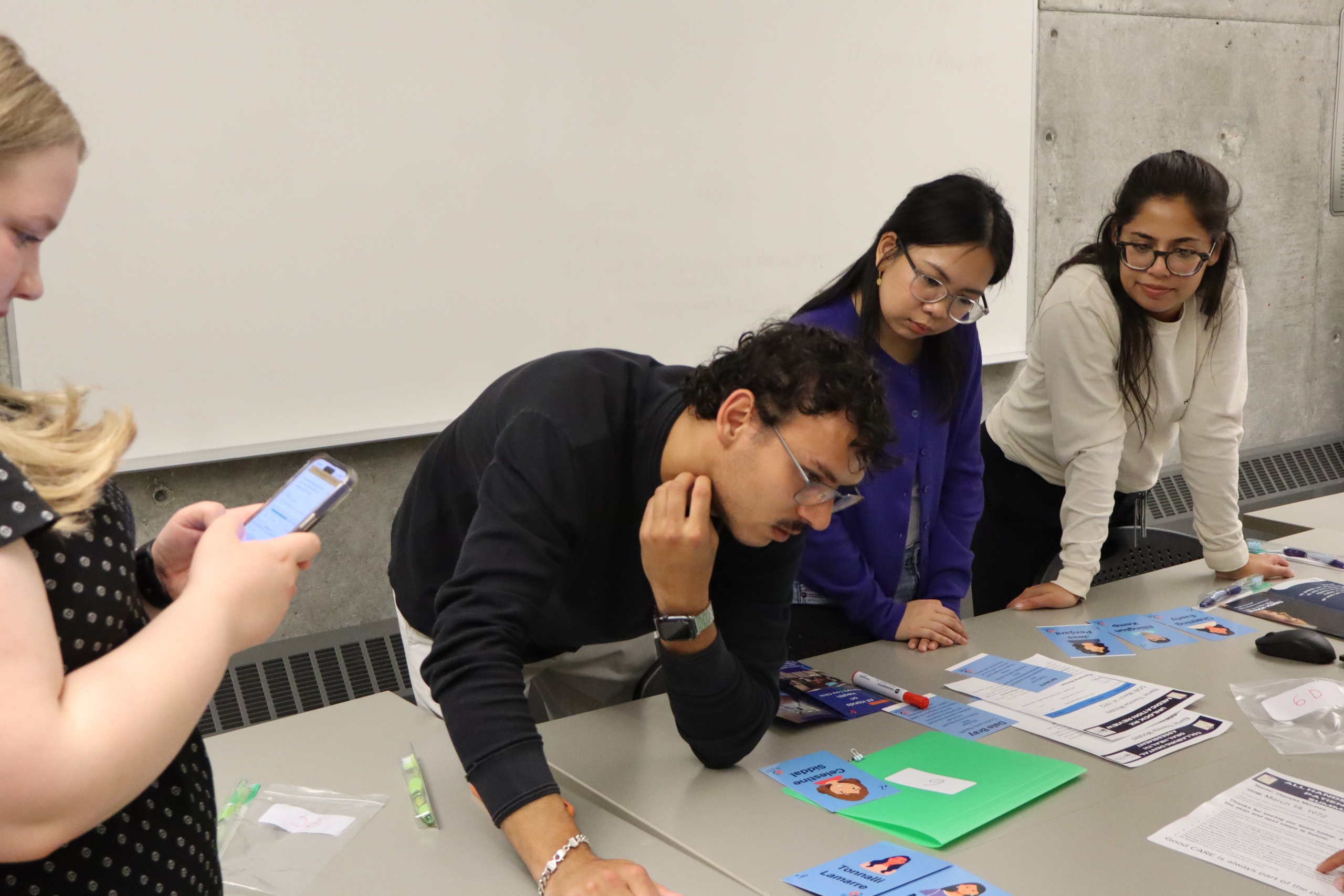 A group of students working together to solve a puzzle.