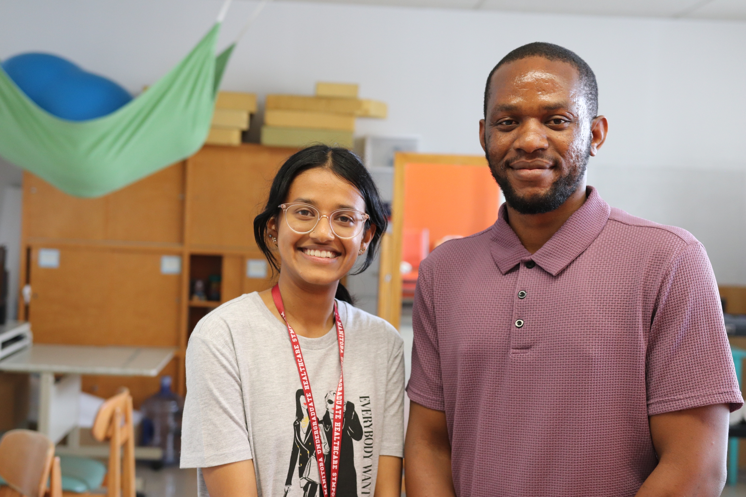 Bliss Earnest and Timothy Igbokwe in a research lab.