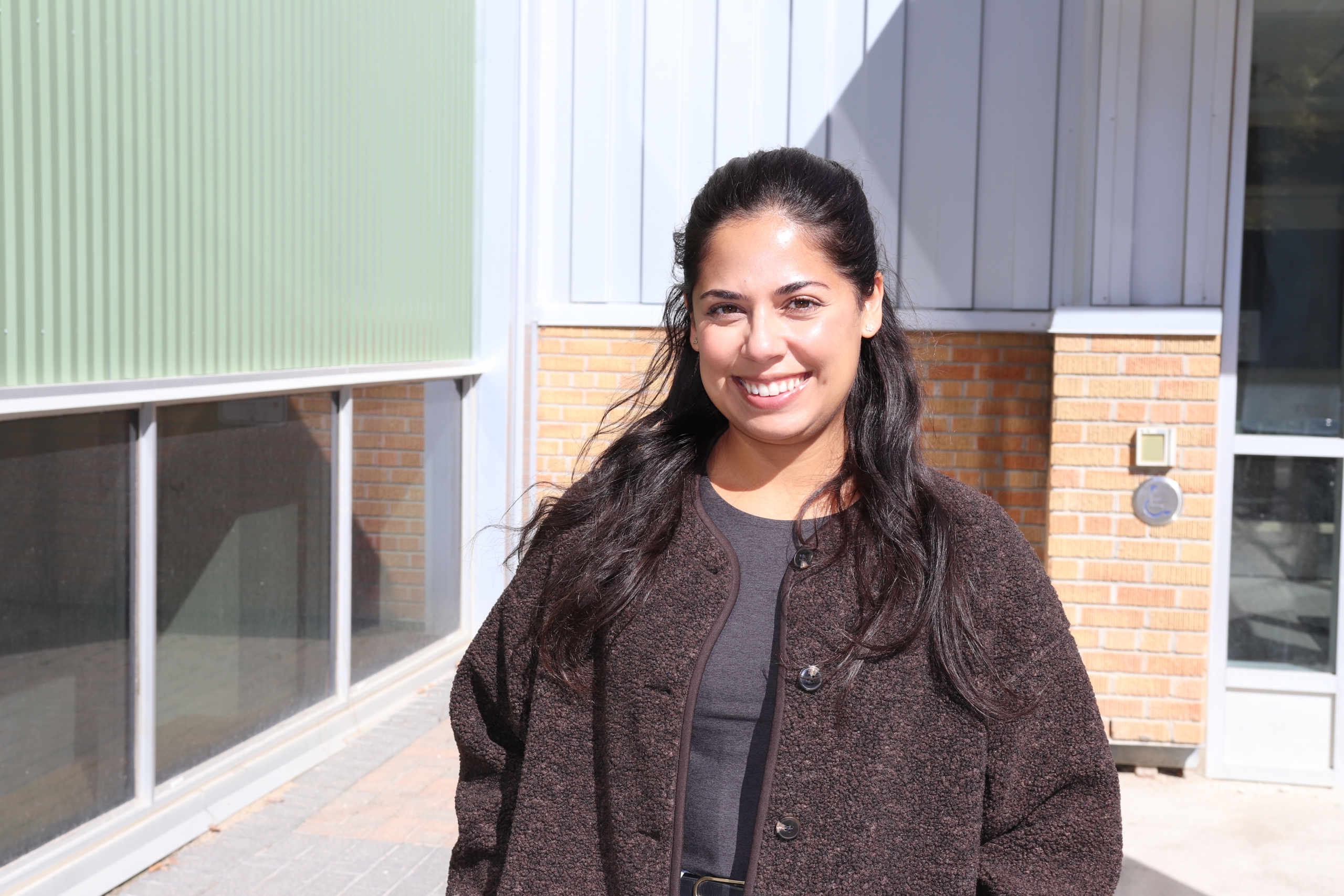 Kirstin Maharajh outside the College of Rehabilitation Sciences building.
