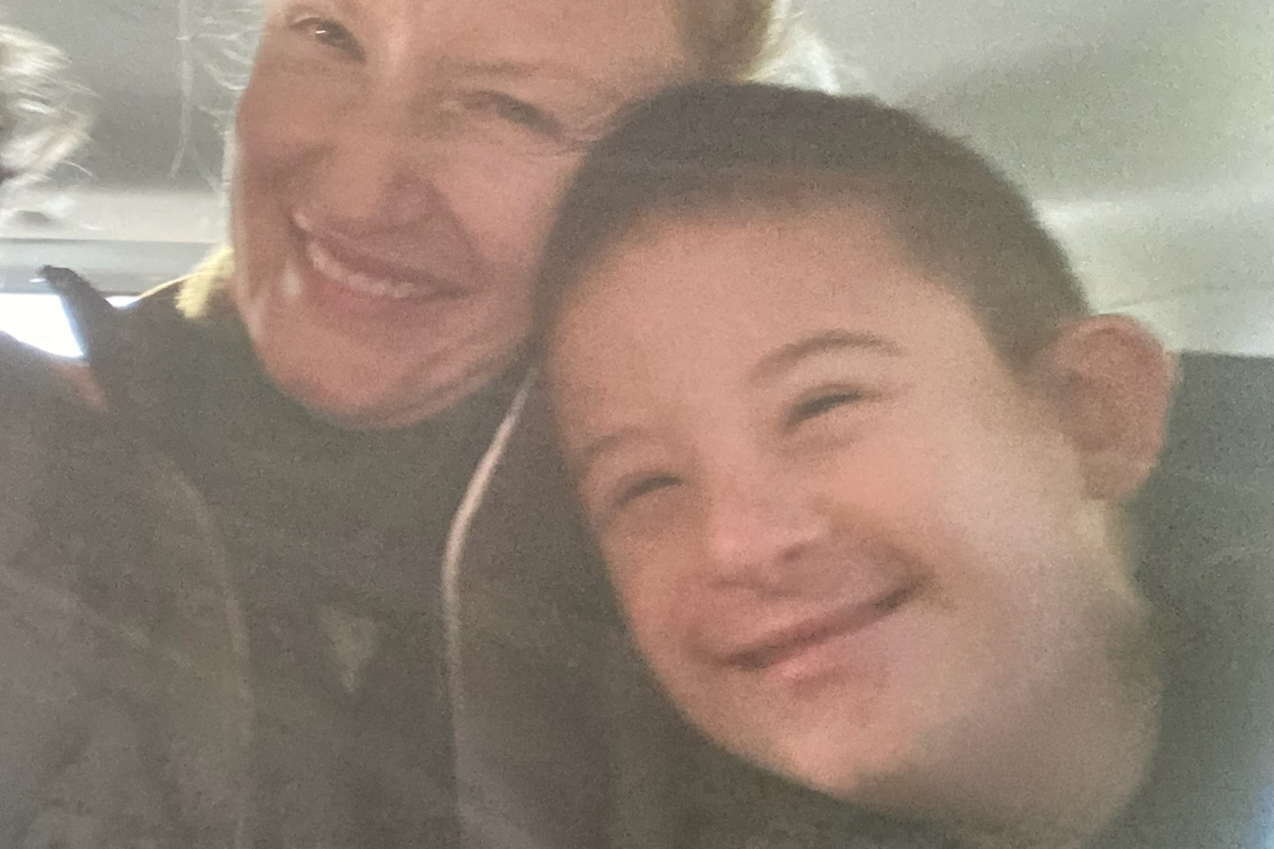 A mother and her young son with Down syndrome