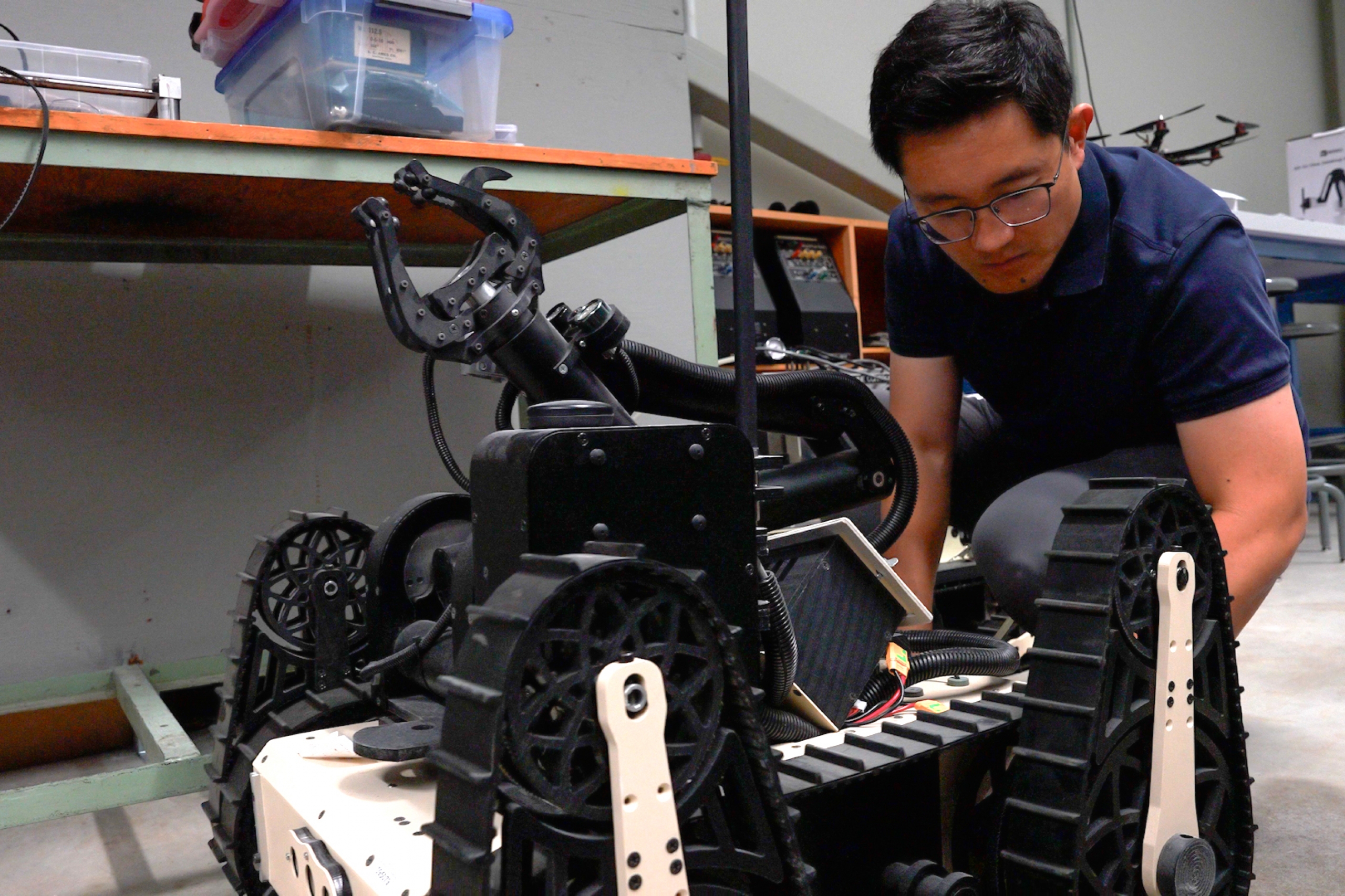 A man looking at equipment