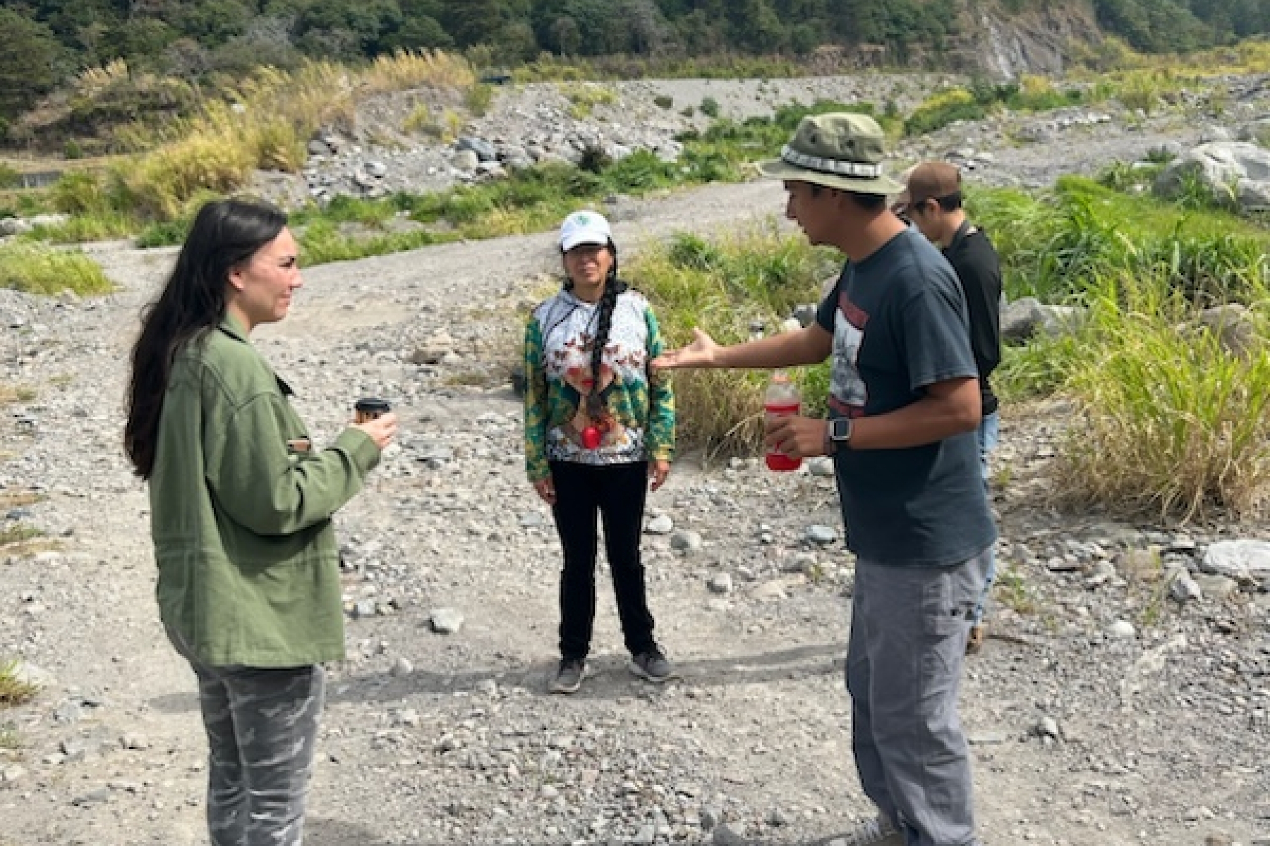 Jennifer speaking with Panama residents in dried riverbed