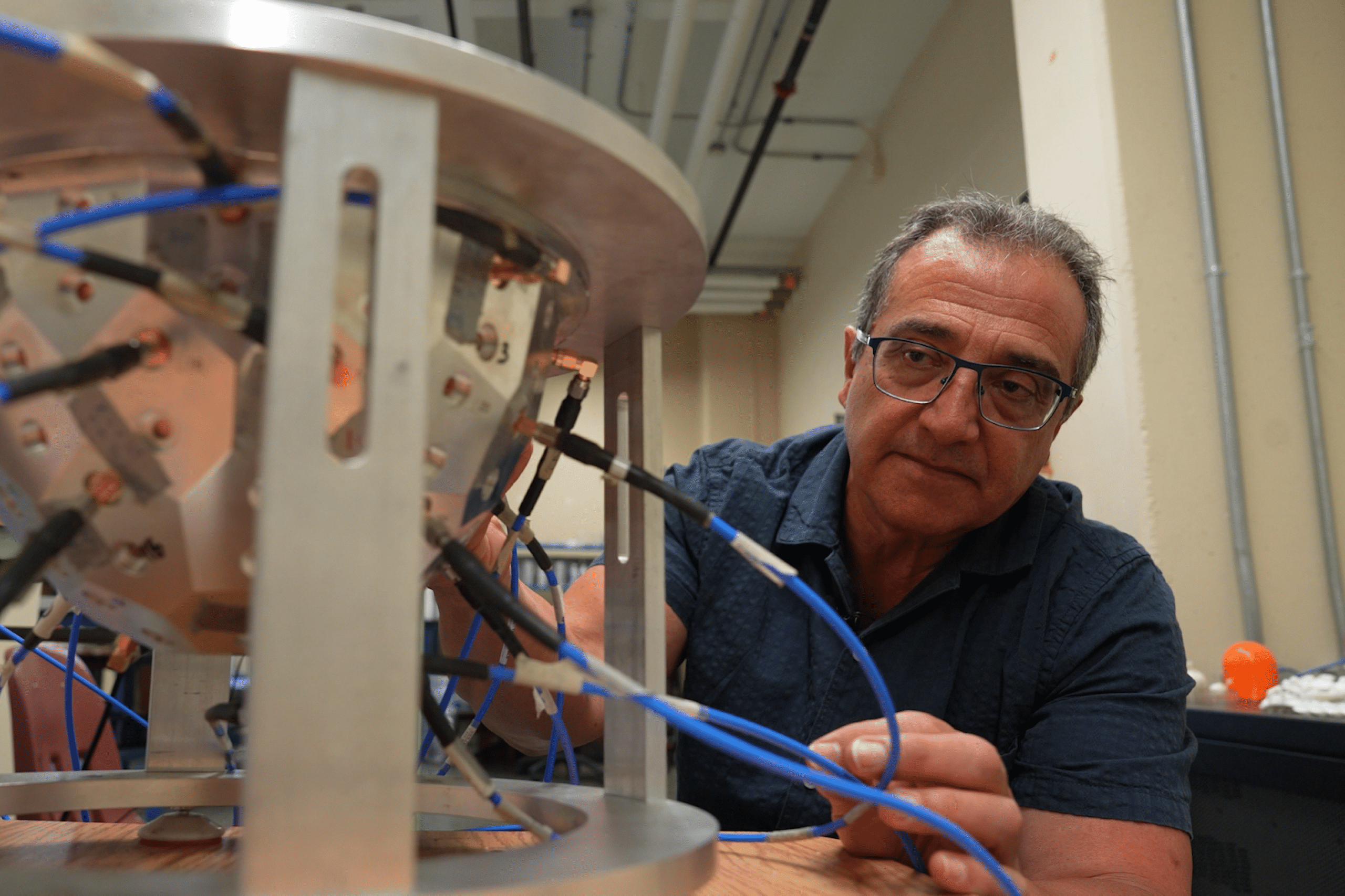 A man beside equipment