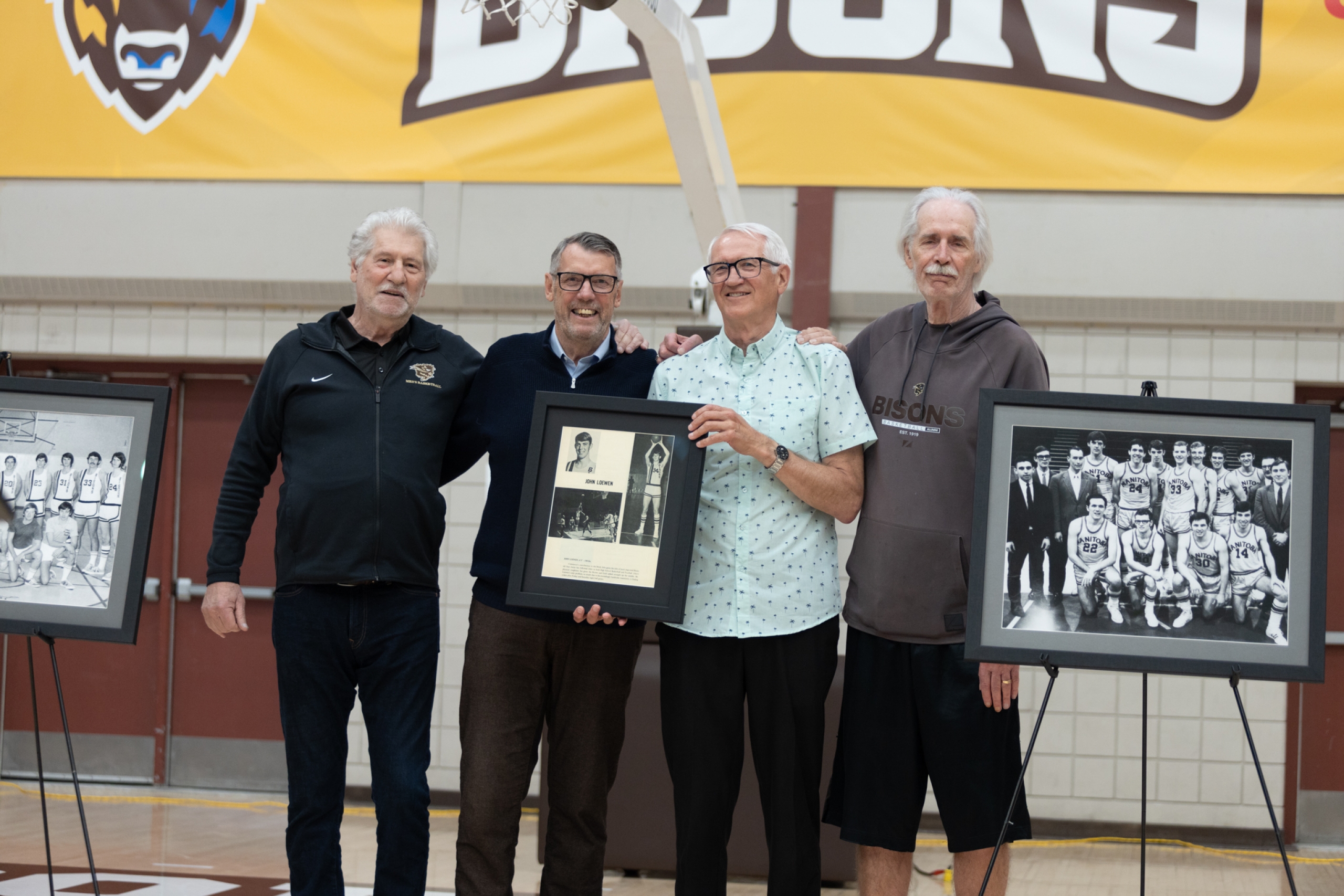 John Loewen and former bisons men's basketball teammates