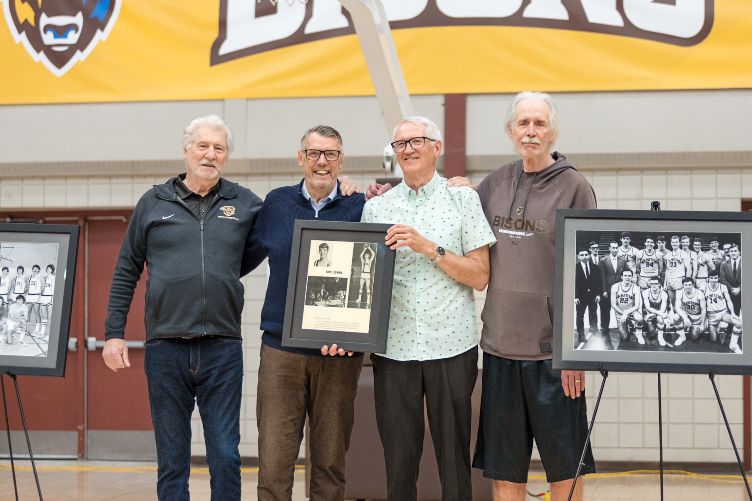 John Loewen and former Bisons men's basketball teammates