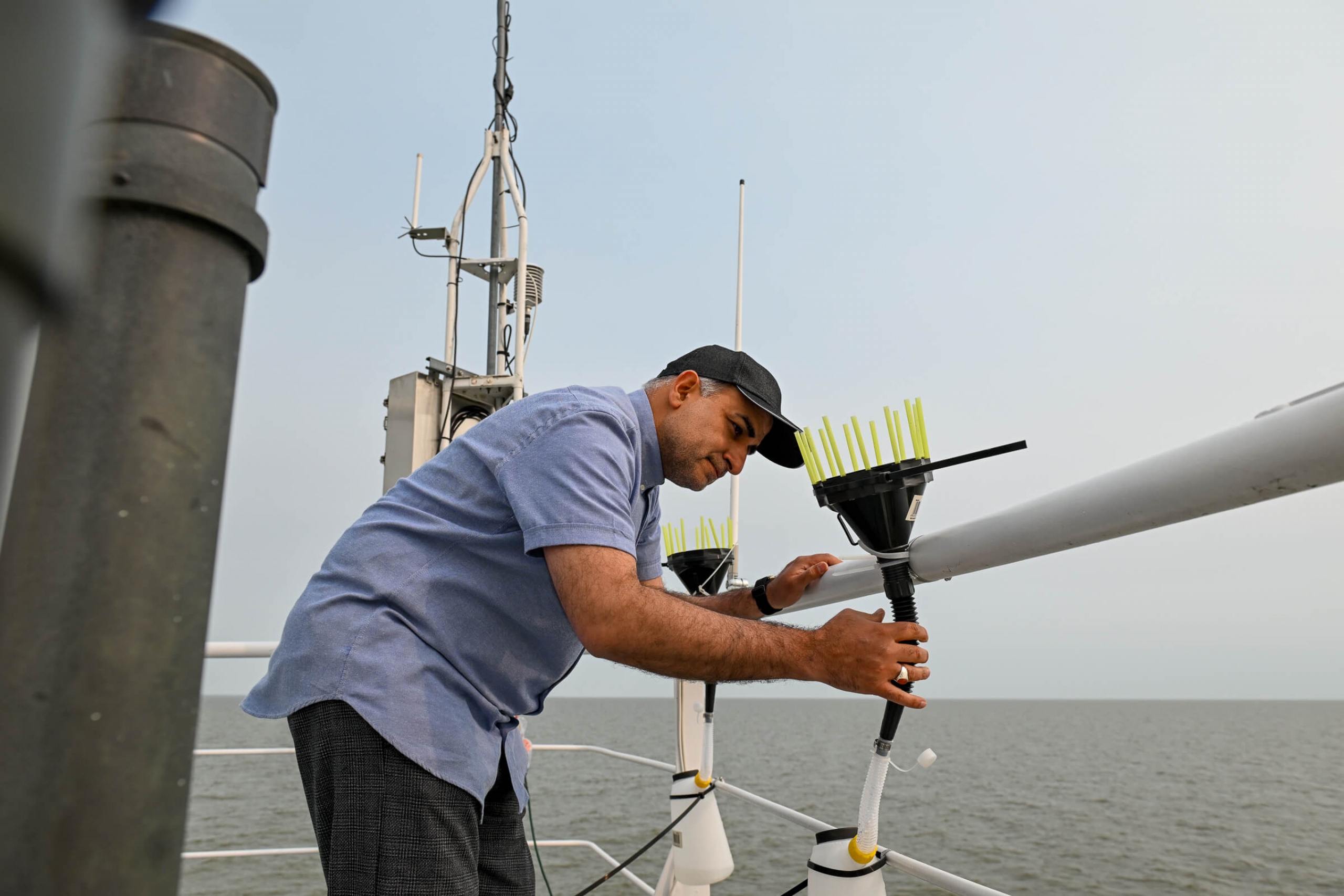 Masoud Goharrokhi takes air samples from the Namao’s top deck.