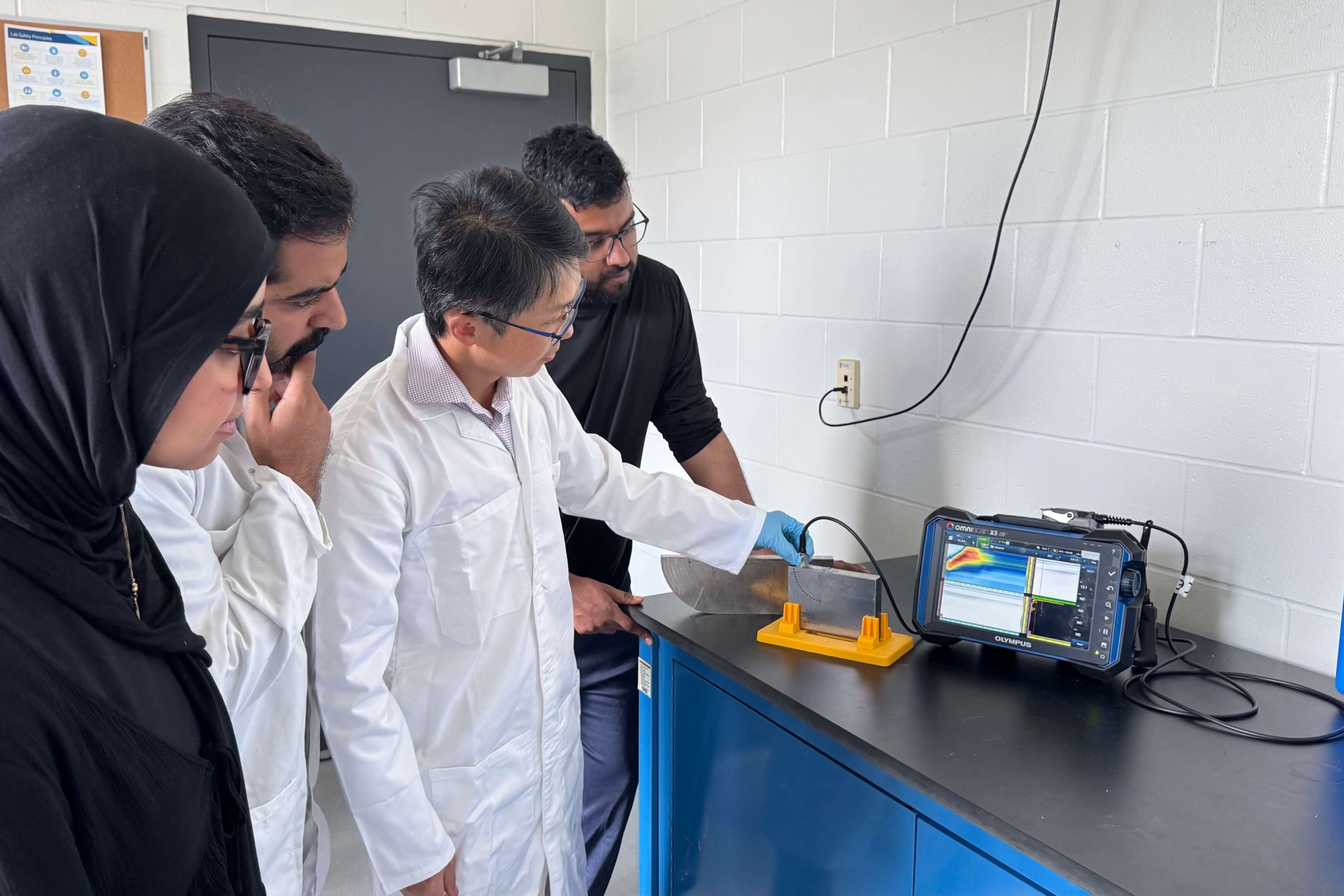 Liang and his team testing material