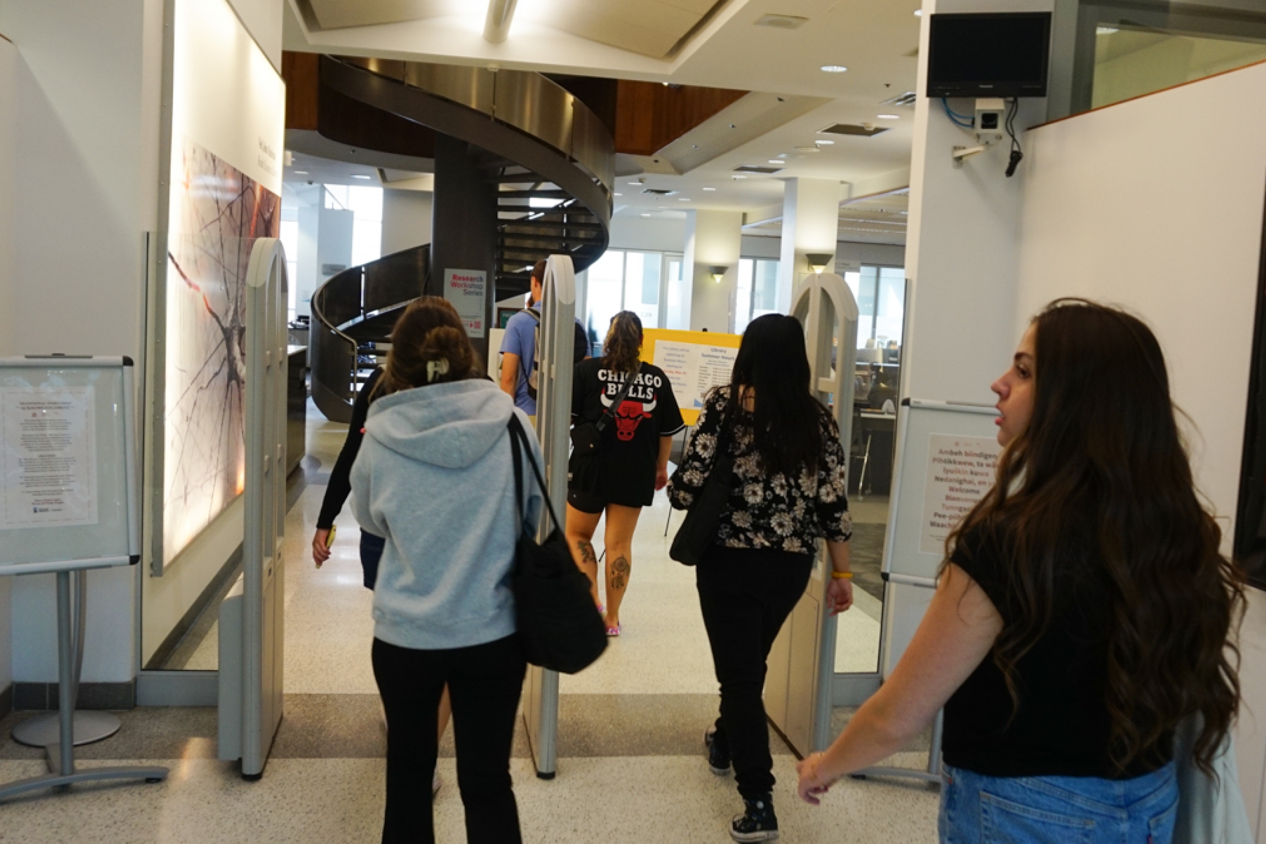 Students entering a library.