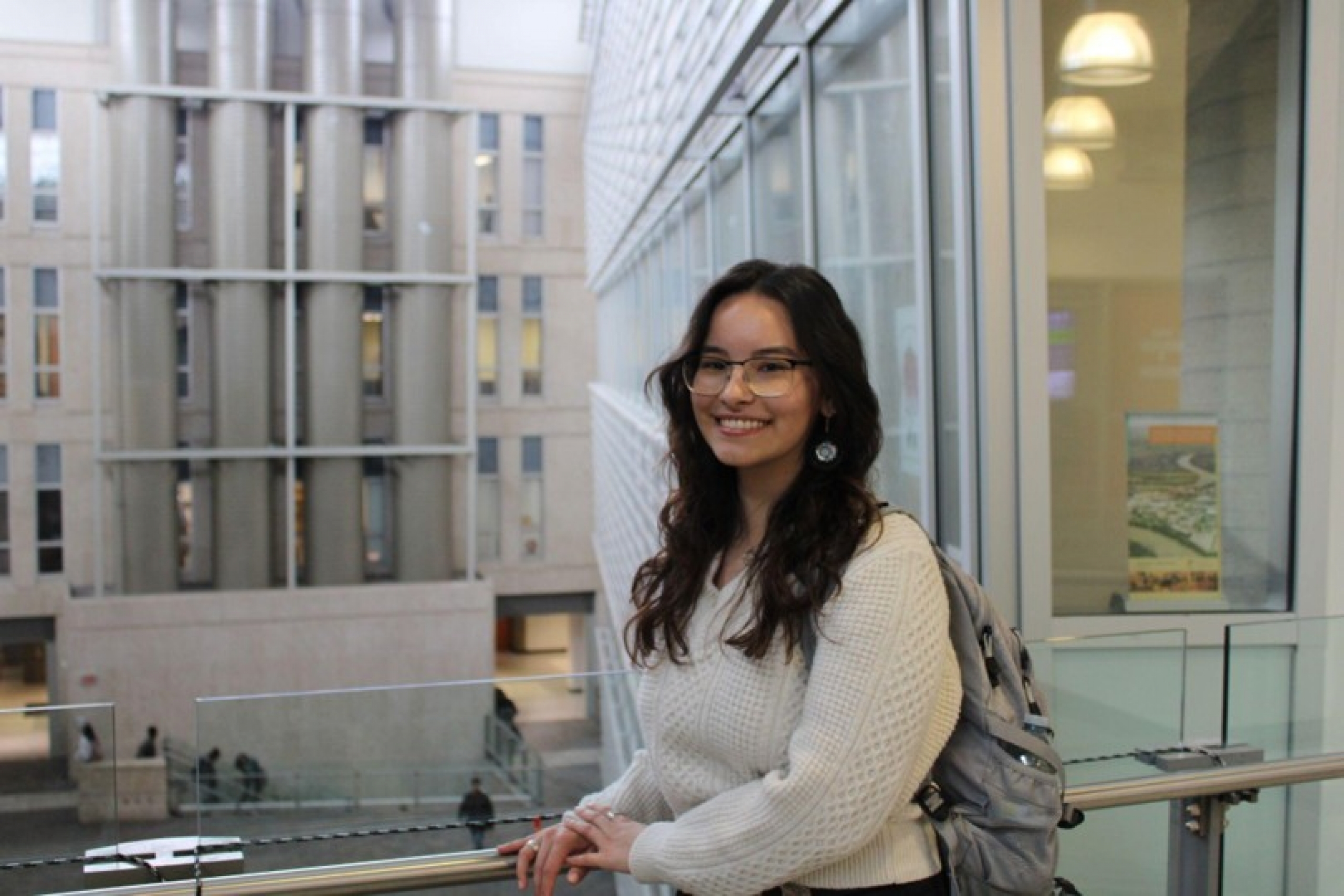 A person posing inside