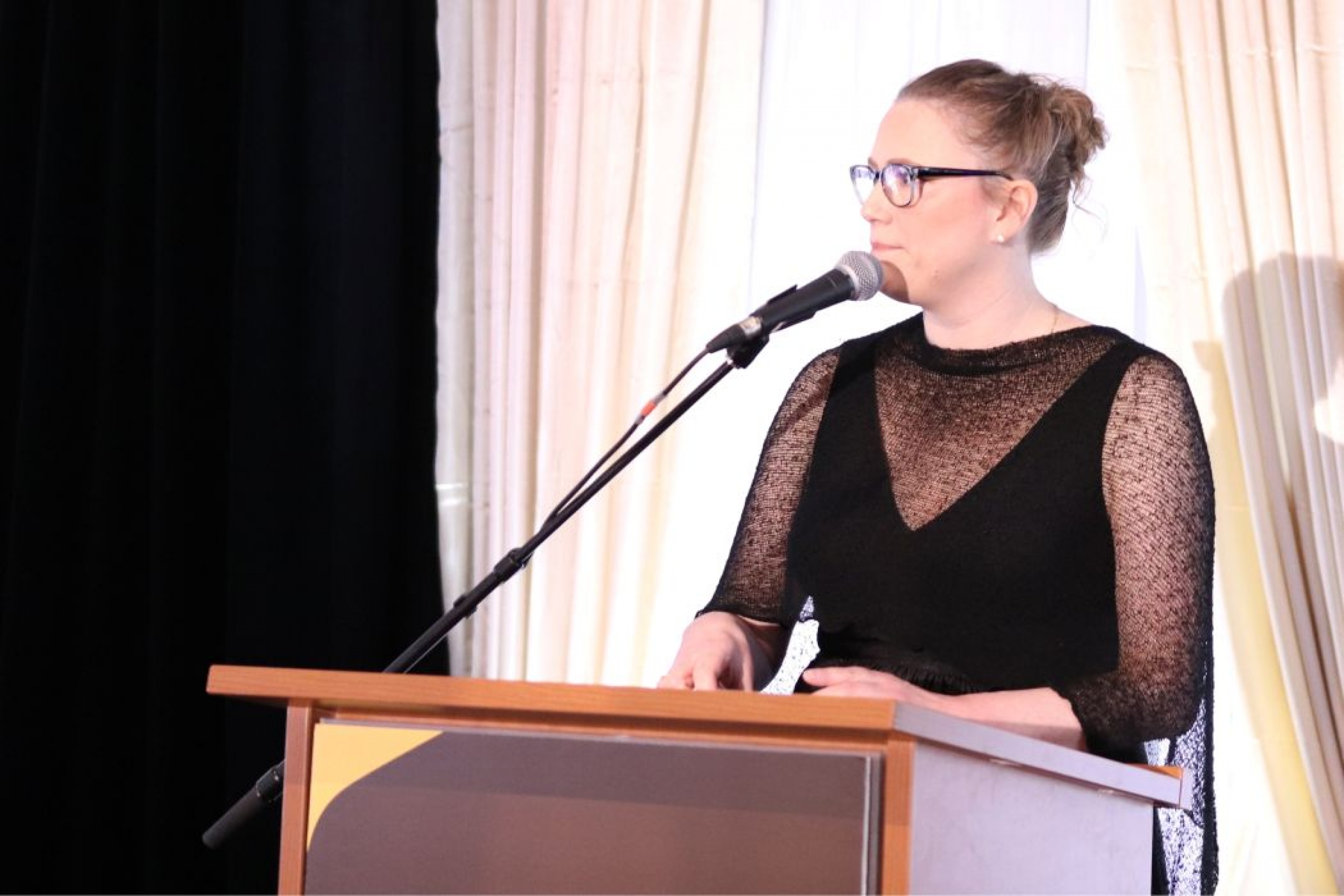 Portrait of Dana Conrad. 