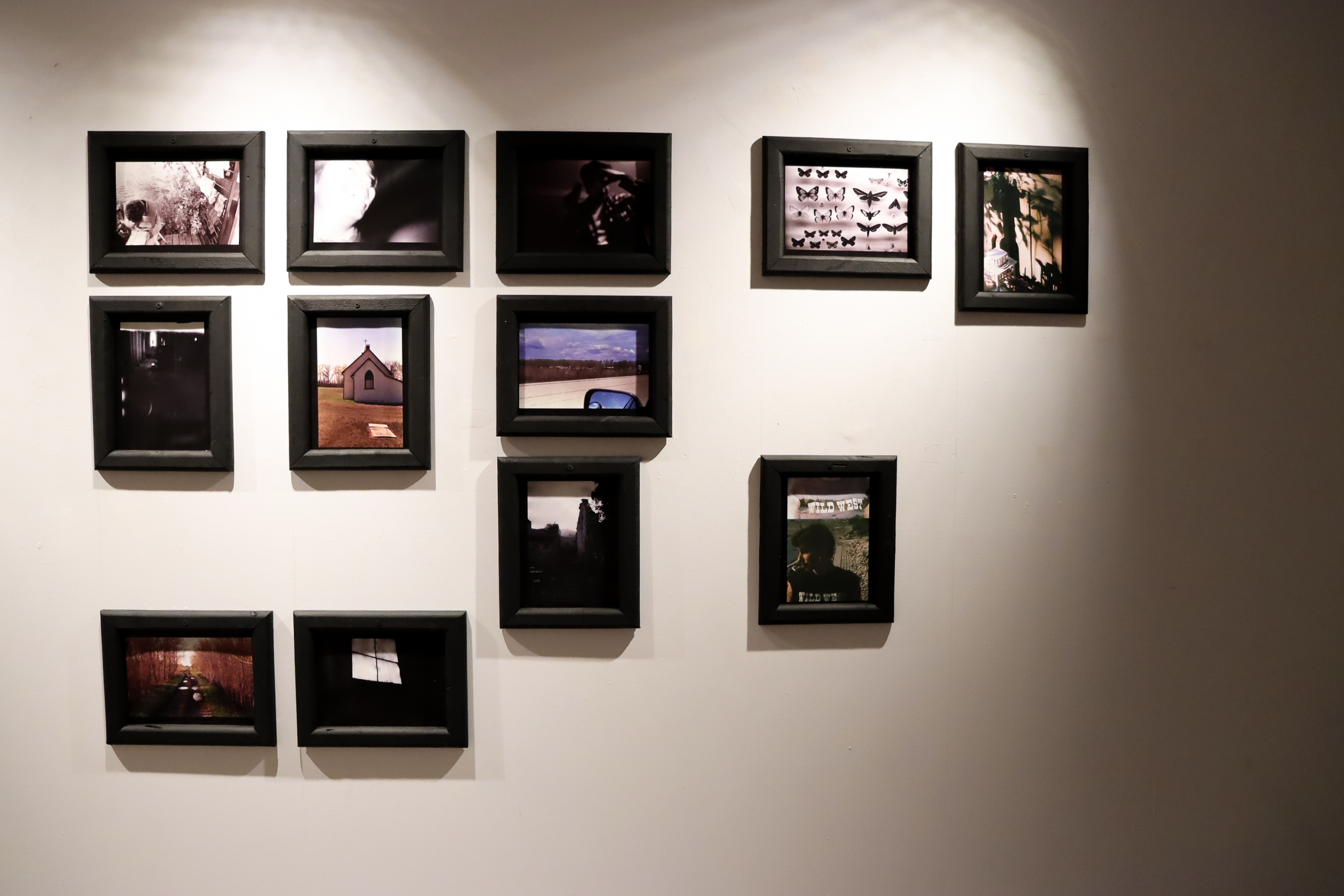 Framed black-and-white photograph viewed in the gallery.