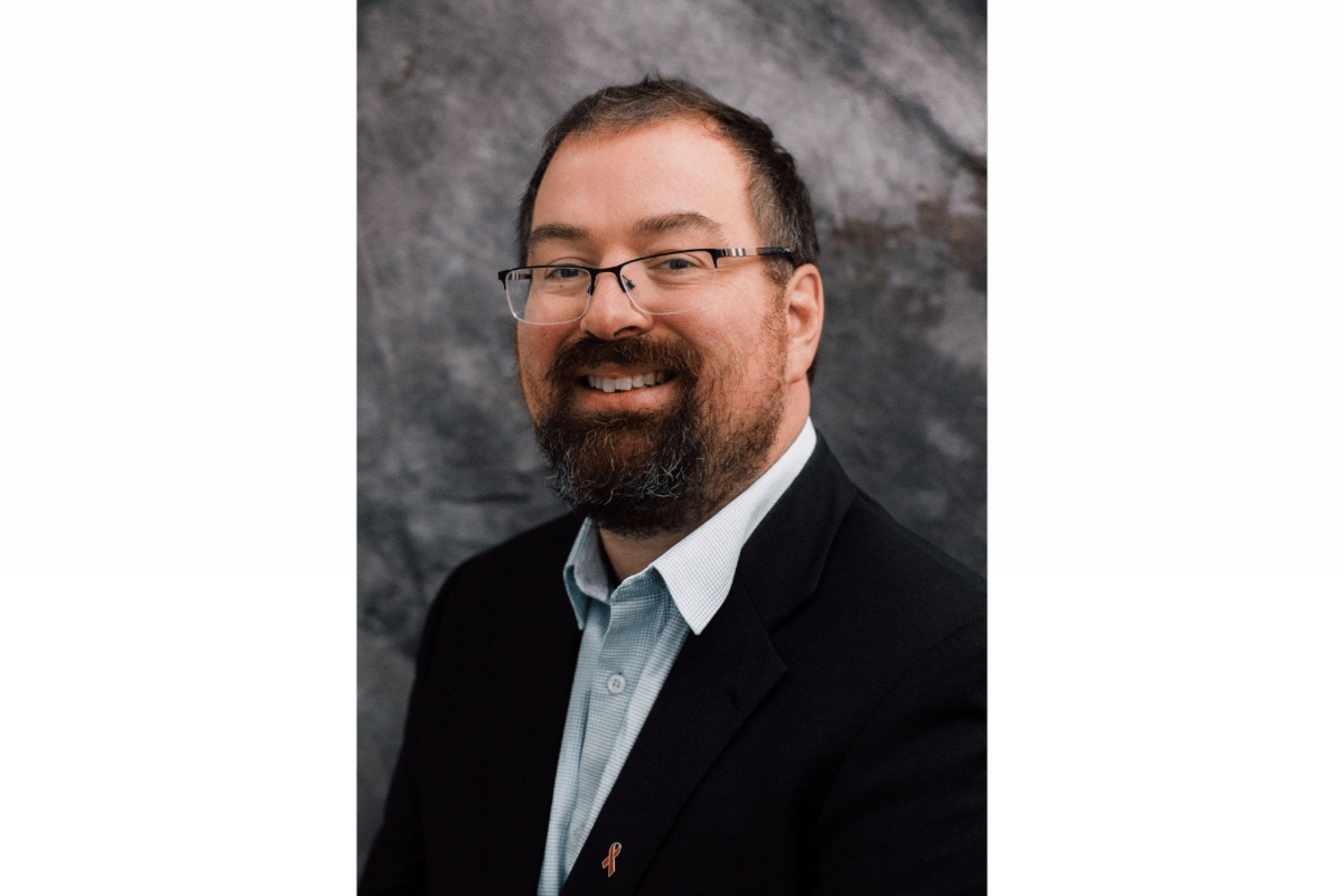 Headshot image of Dr. Lyle McKinnon