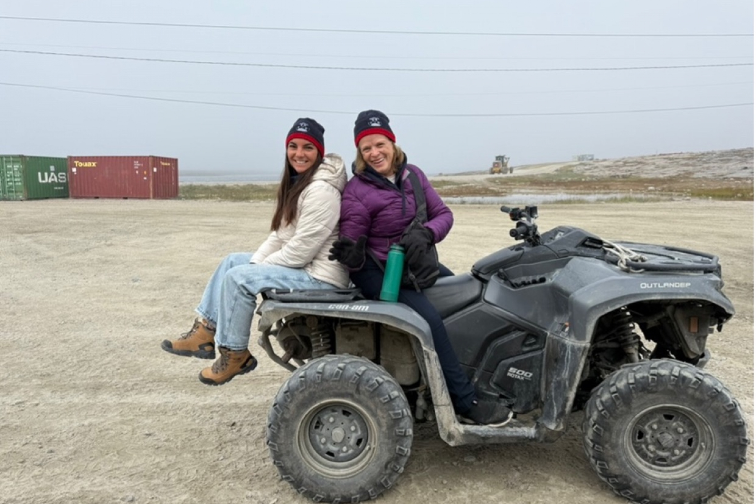 Miexner and Bonneycastle in Nunavut, riding on a quad 