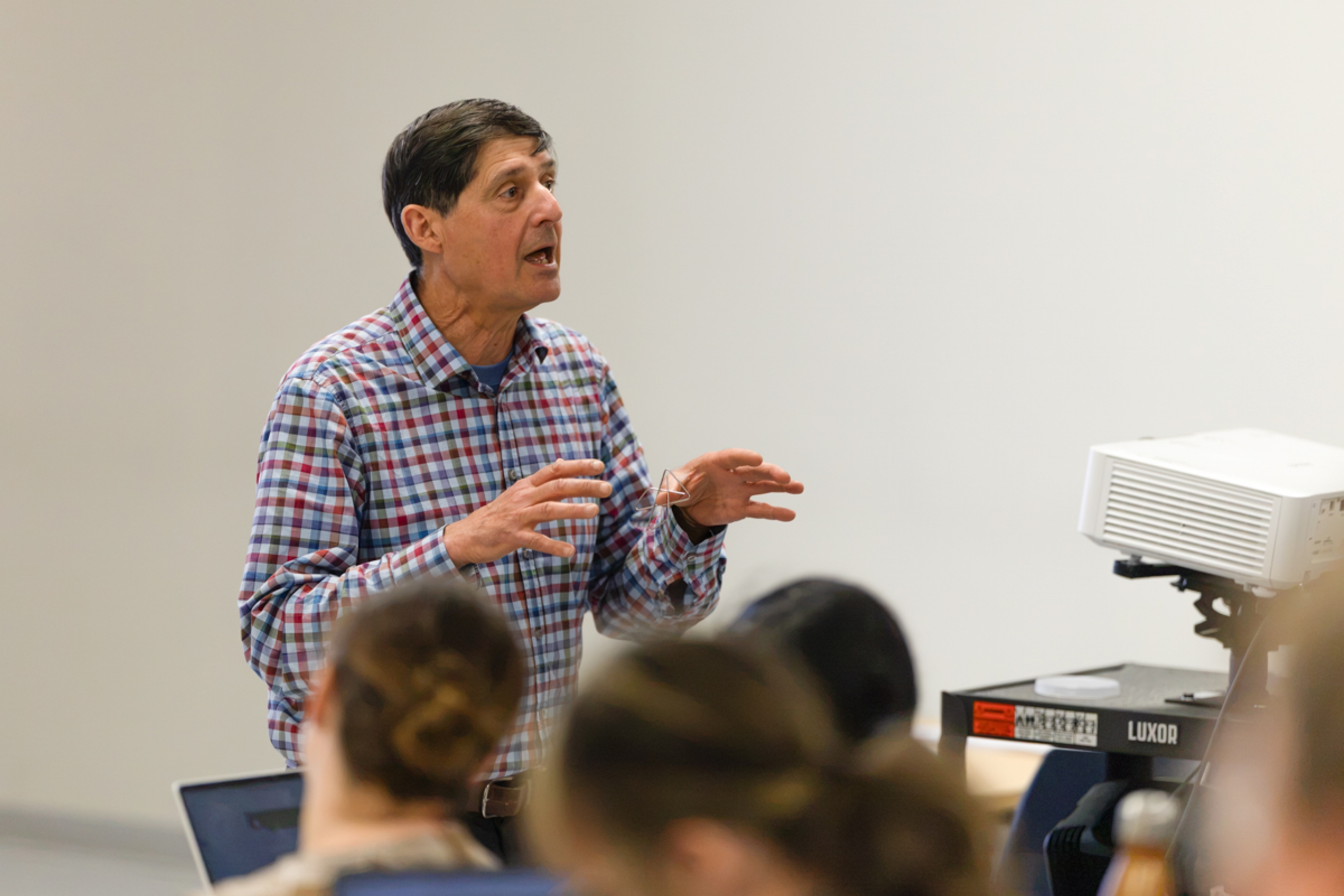 A professor teaches a group of students.