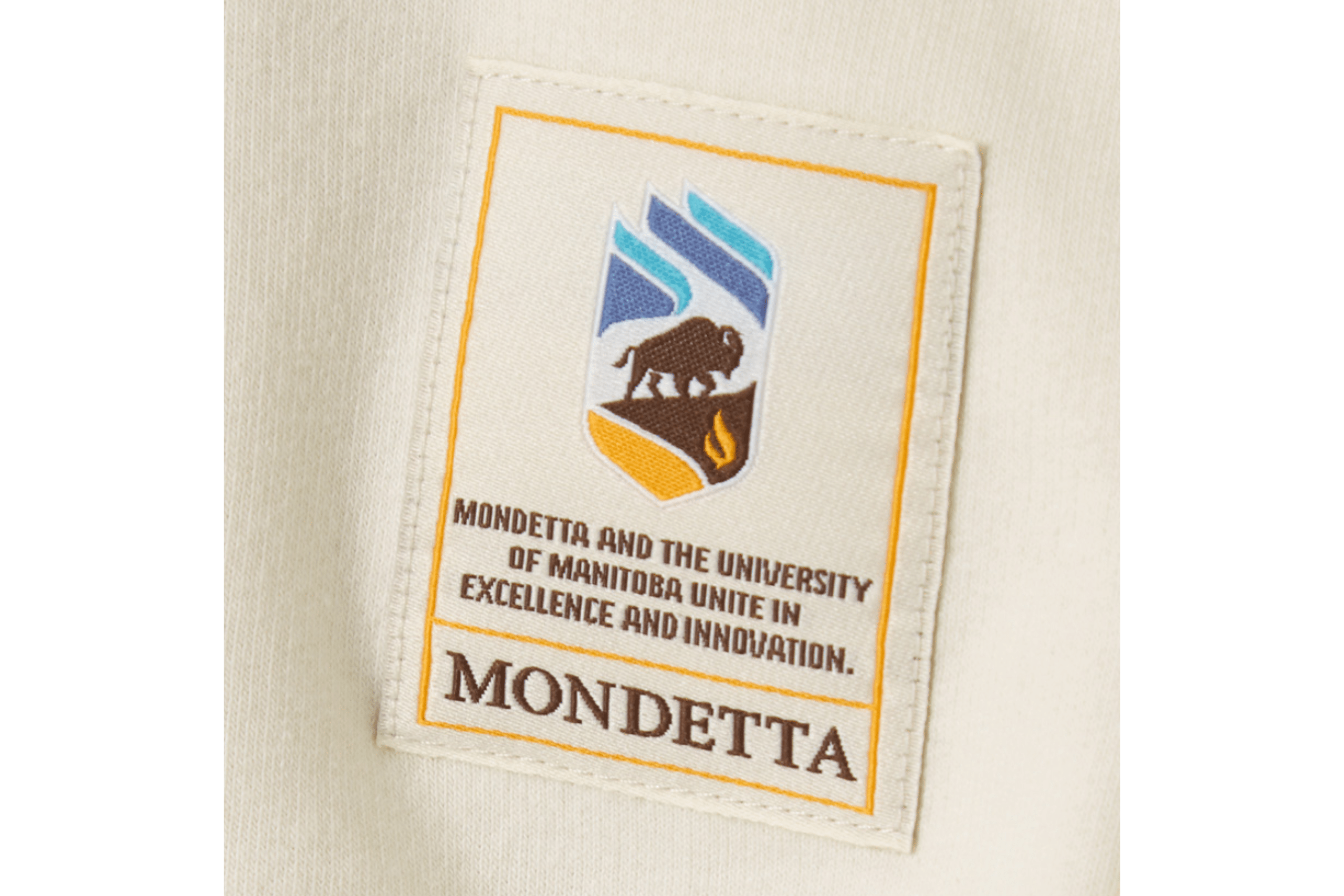 Mondetta and UM clothing tag