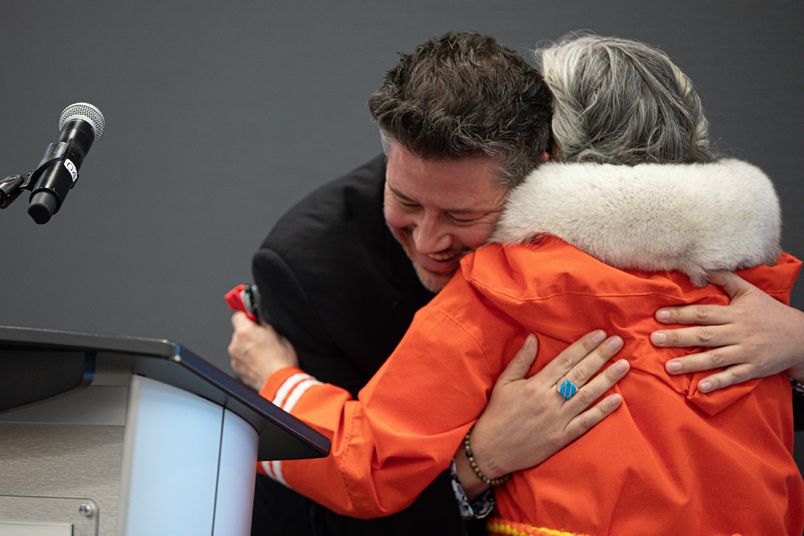 Sky Bridges hugging Survivor Levnina Brown
