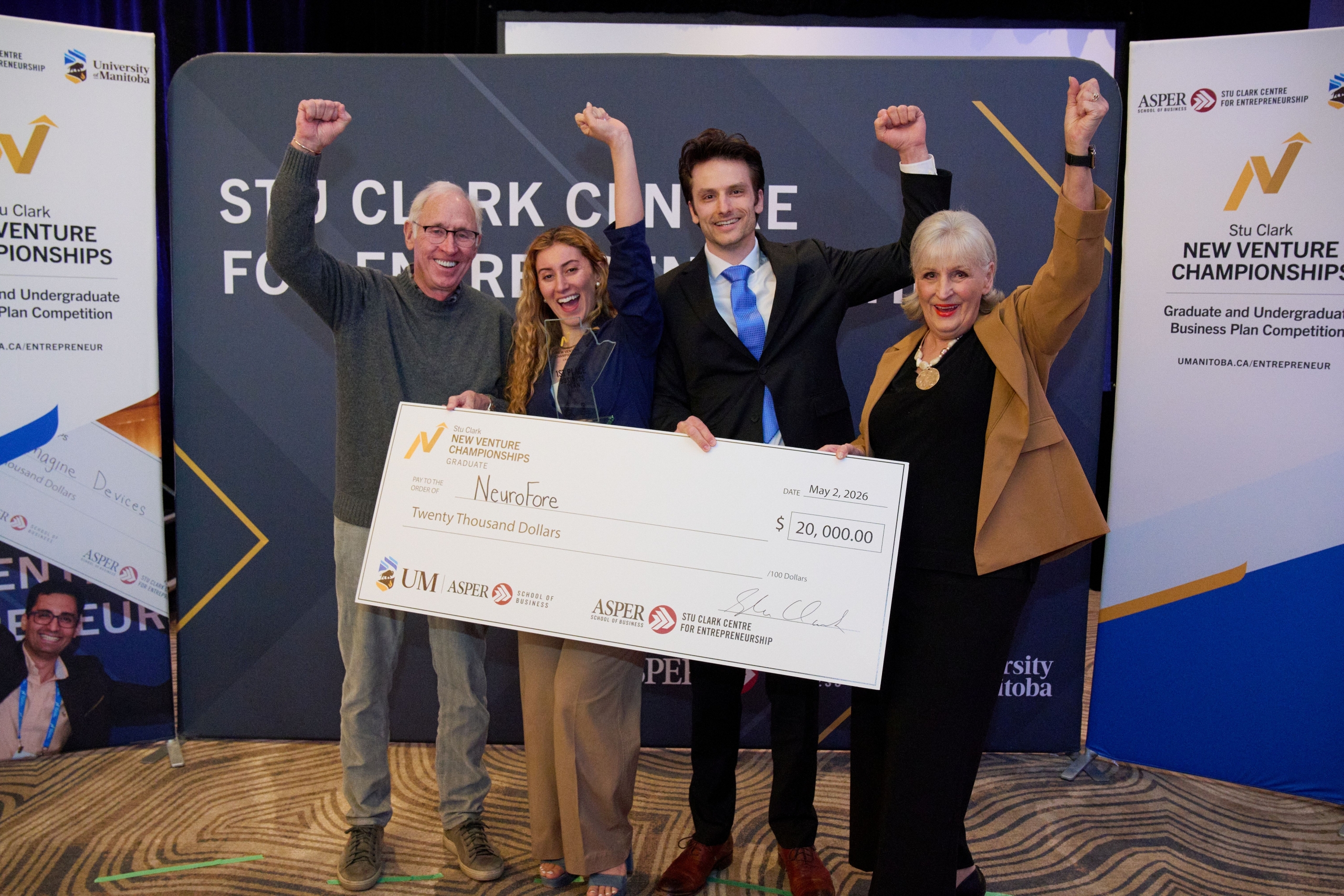 NeuroFore team with a large cheque