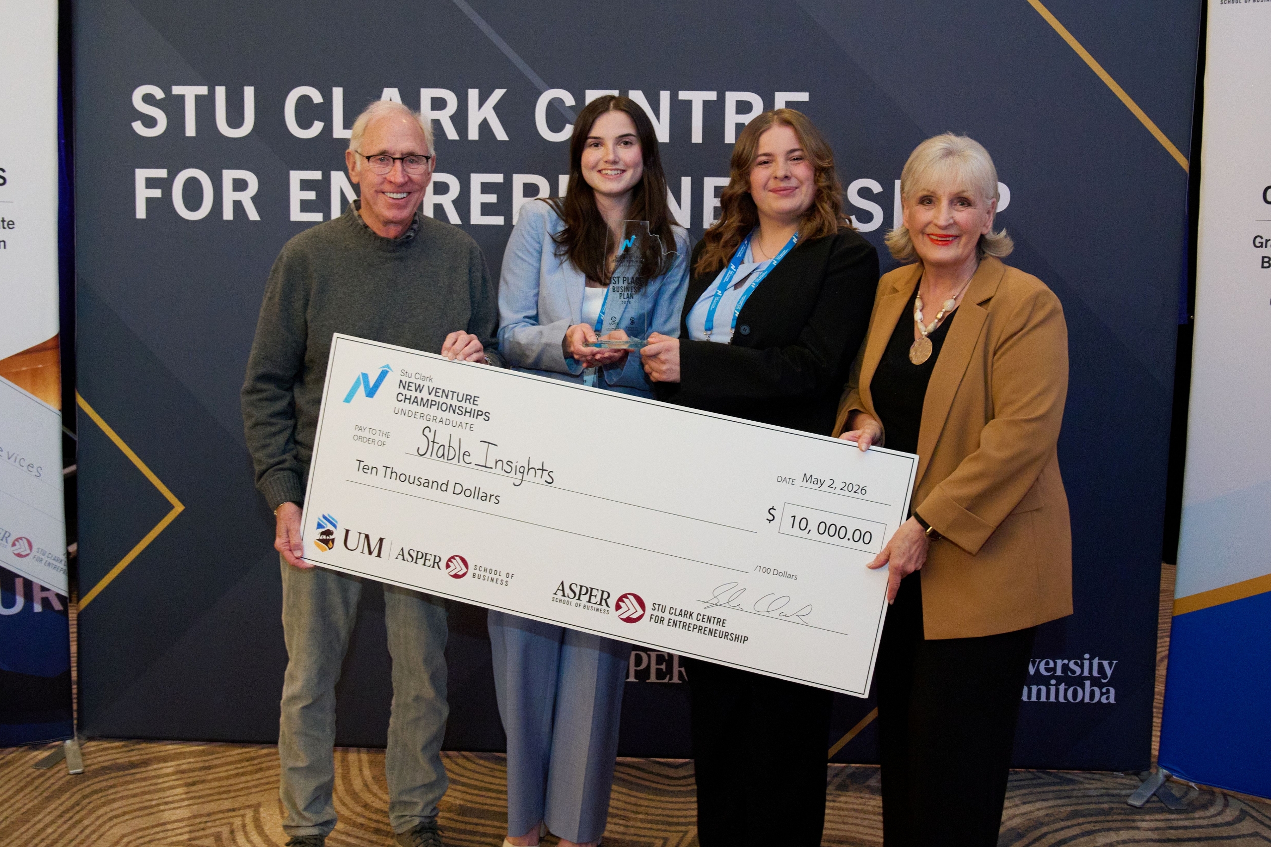 Team StableInsights with a big cheque